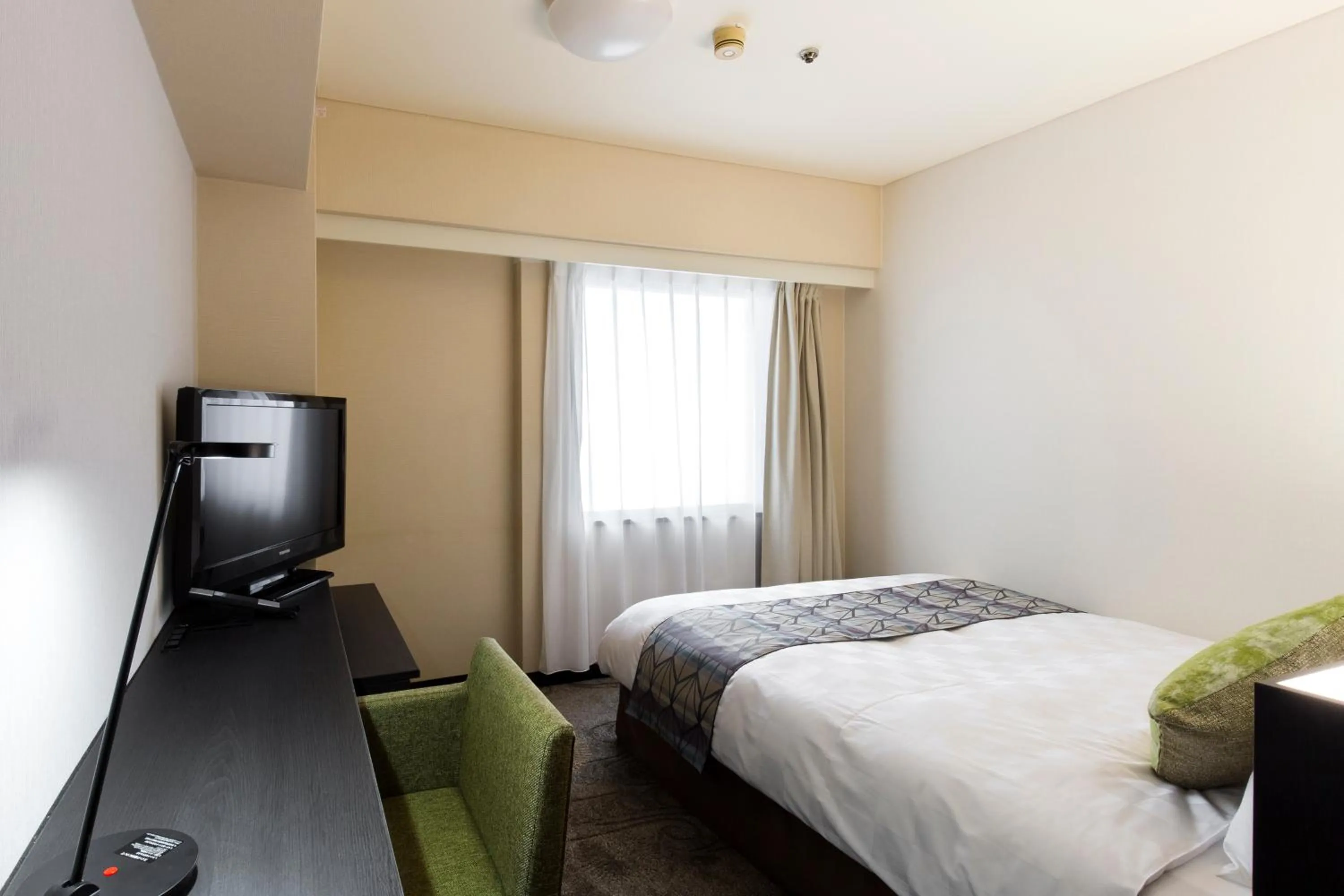 Photo of the whole room, Bed in Takamatsu Tokyu REI Hotel