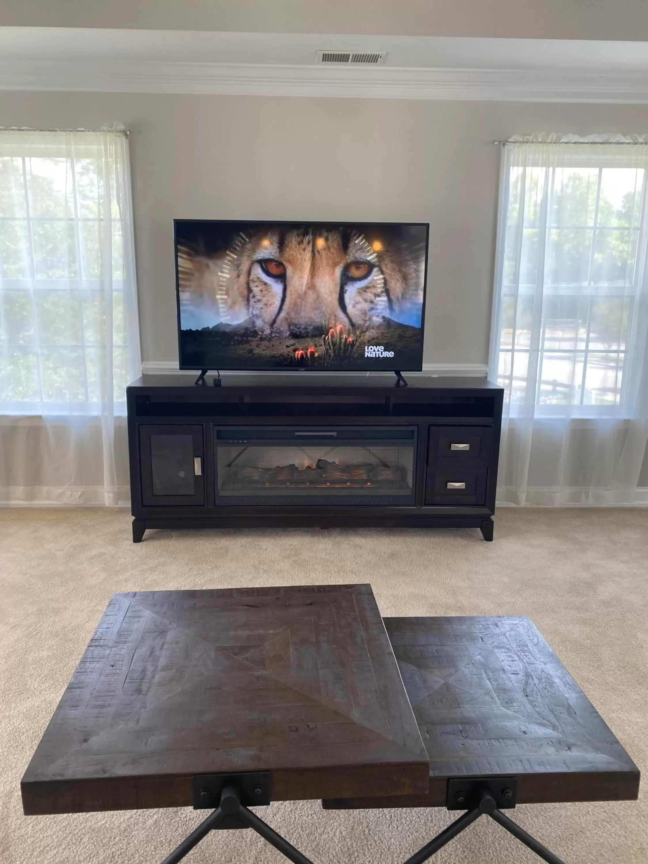 Living room, TV/Entertainment Center in The Cypress Inn