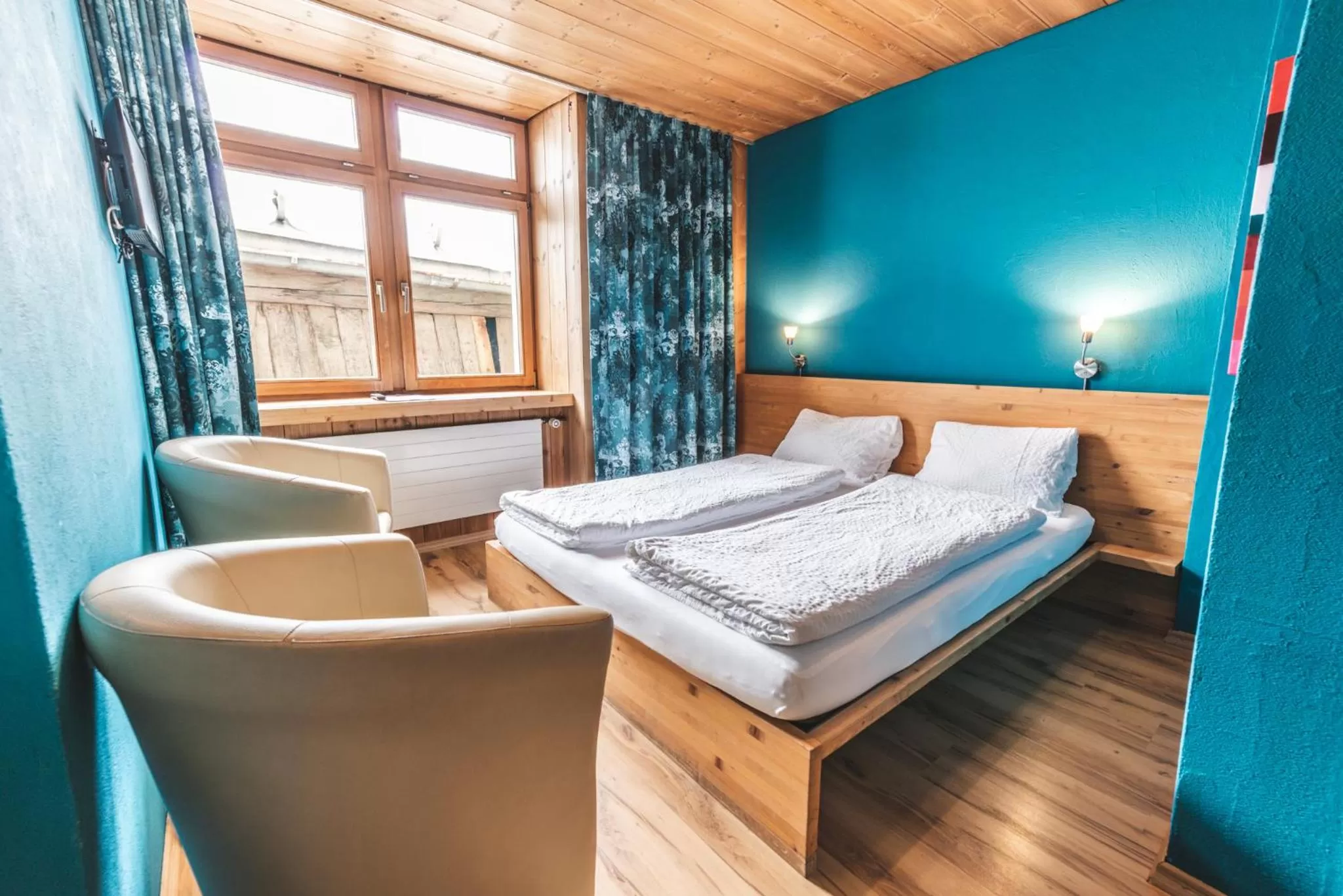 Photo of the whole room in CURUNA Hotel-Garni