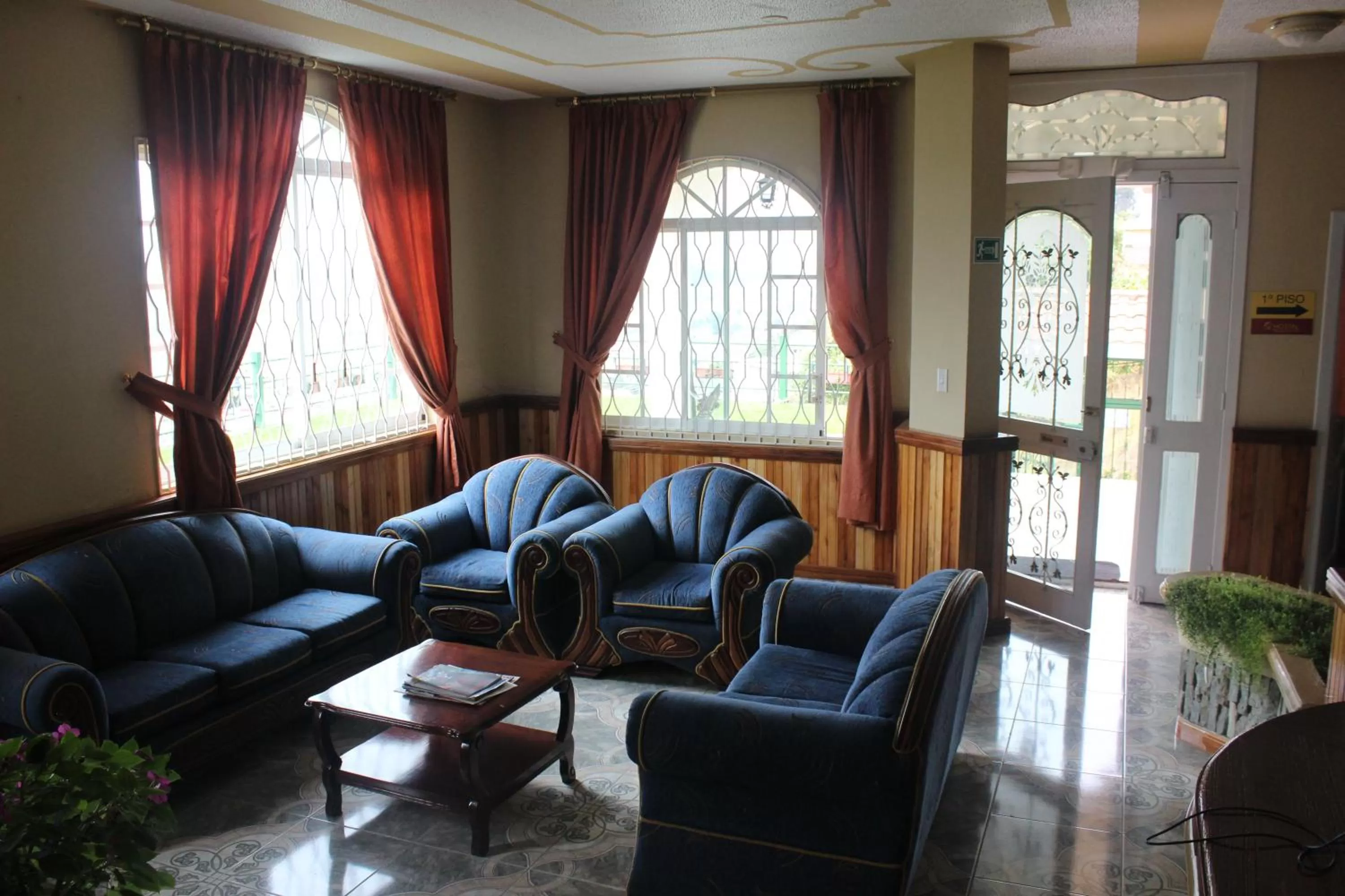 Communal lounge/ TV room, Seating Area in Hostal Mirador de Otavalo