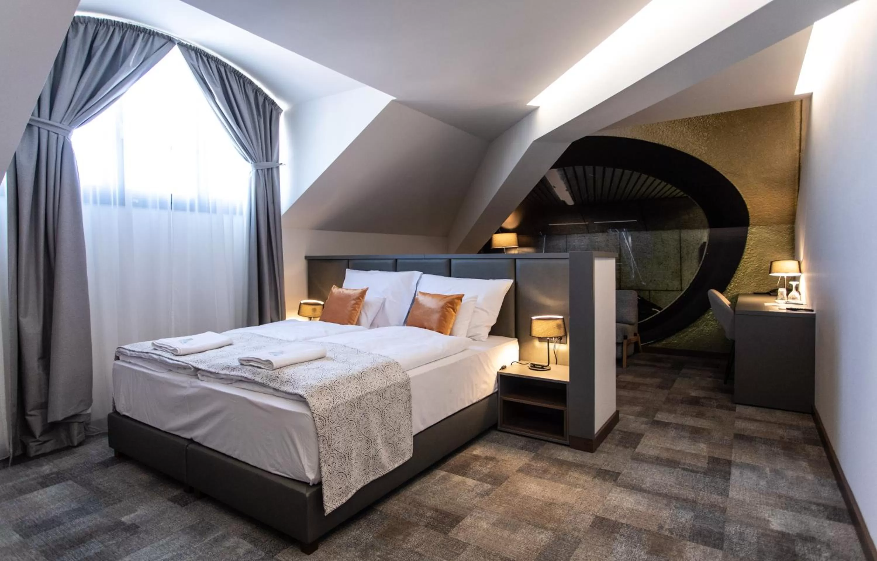 Bed in Artis Boutique Hotel