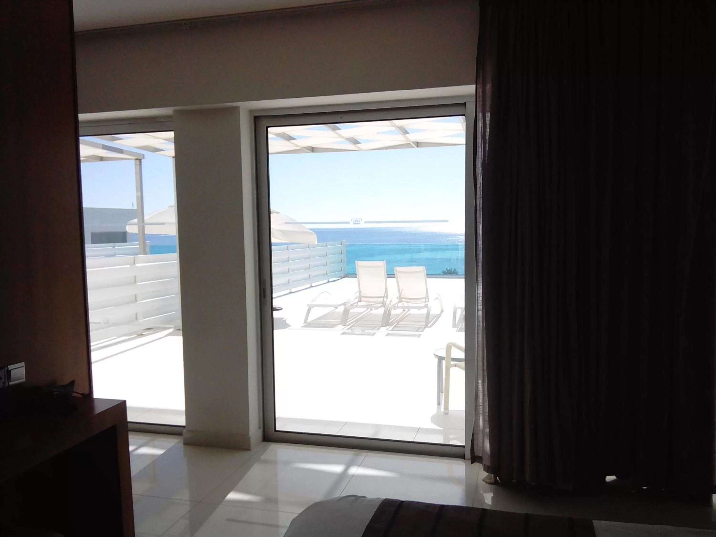 Balcony/Terrace in King Evelthon Beach Hotel & Resort