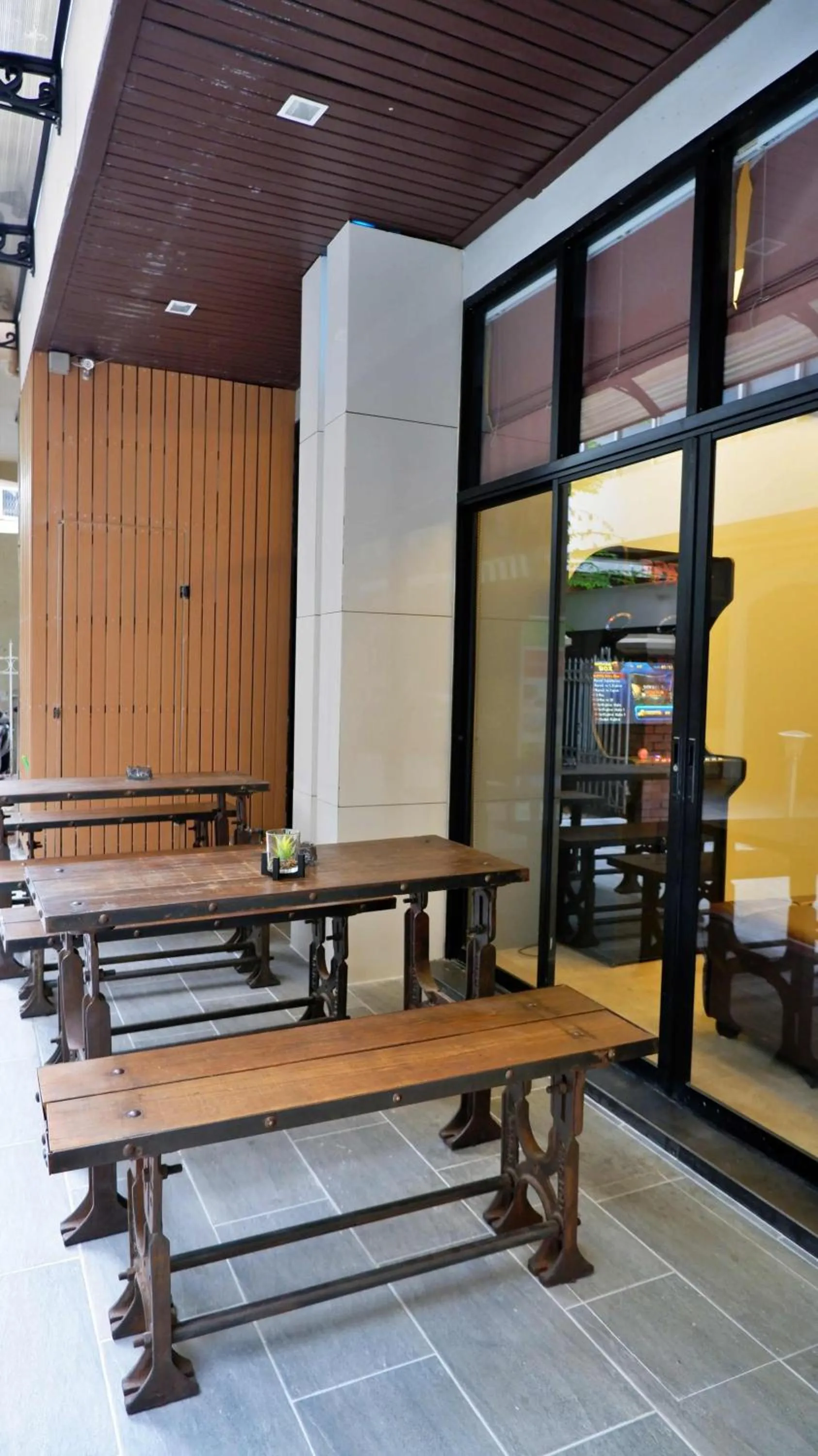 Seating area in iCheck inn Gems Center Silom