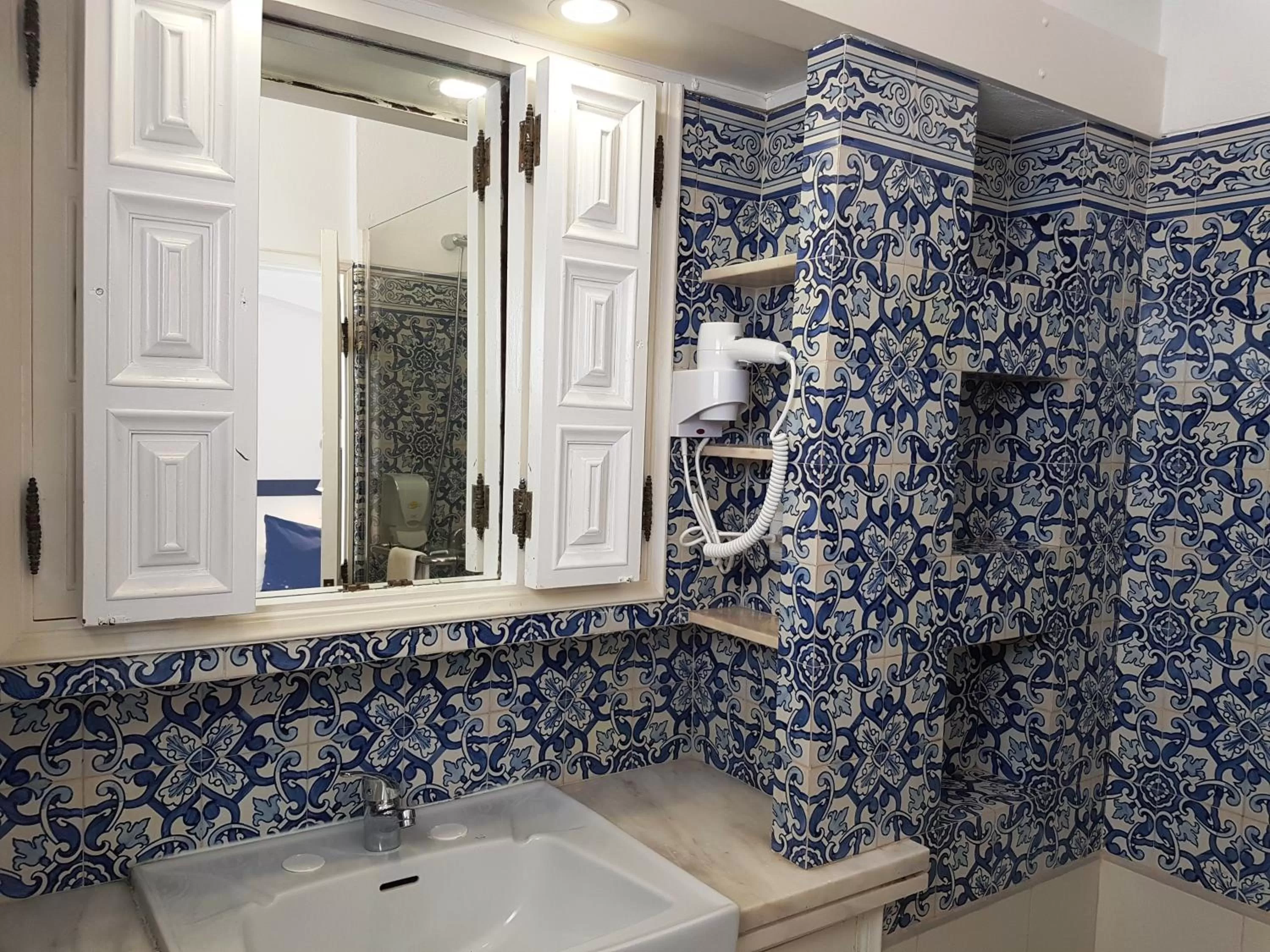 Toilet in Apartamentos Turisticos Soldoiro