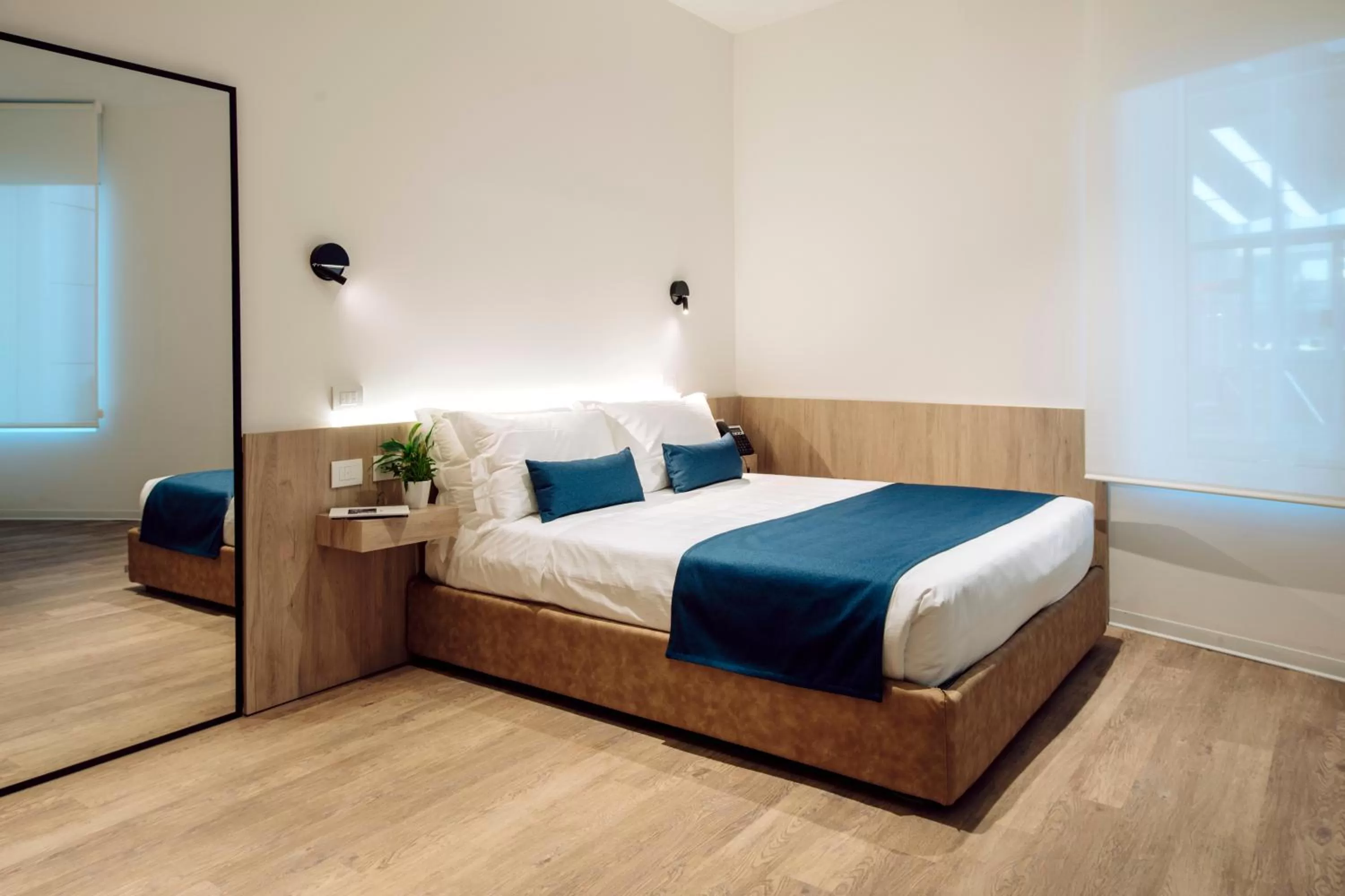 Photo of the whole room, Bed in Air Rooms Rome Airport by HelloSky