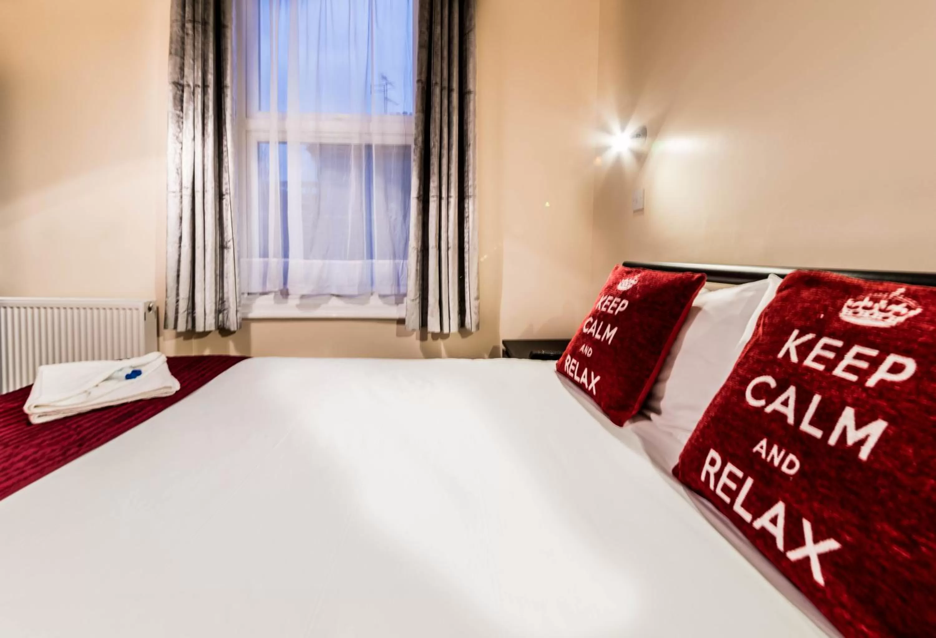 Bed in Hellenic Hotel by Saba