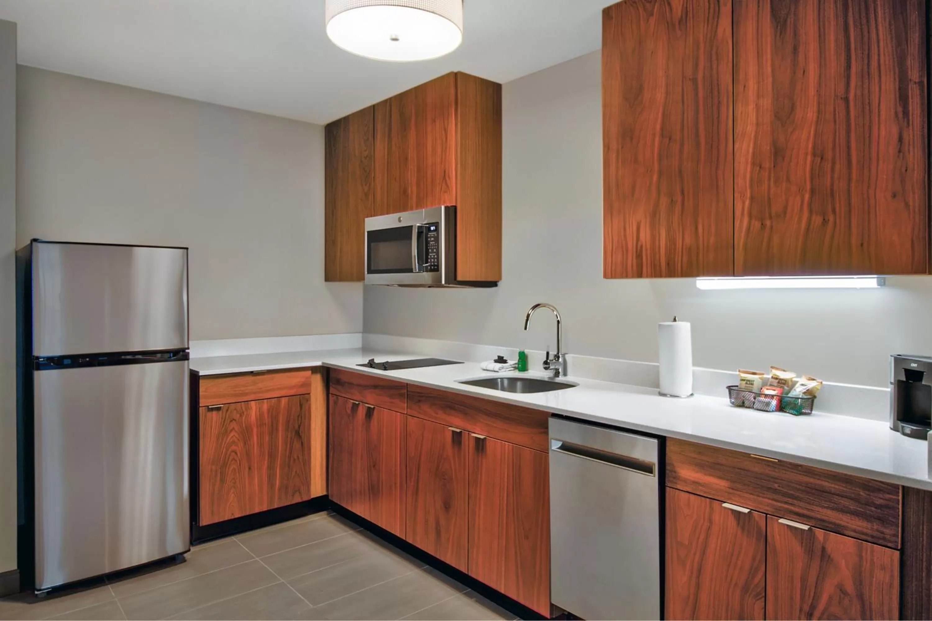 Kitchen or kitchenette in Residence Inn by Marriott Orlando at FLAMINGO CROSSINGS Town Center