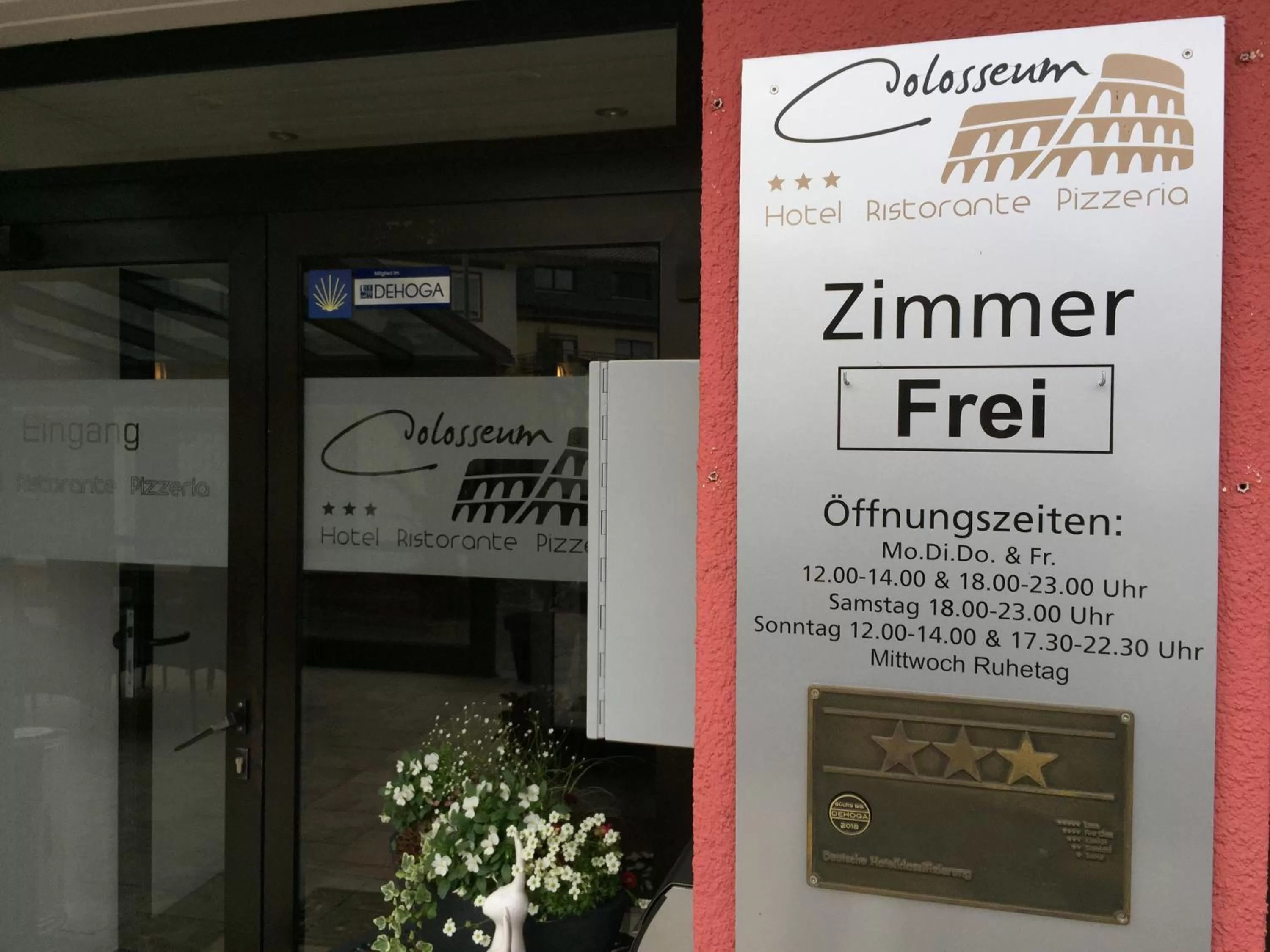 Property logo or sign in Hotel Colosseum