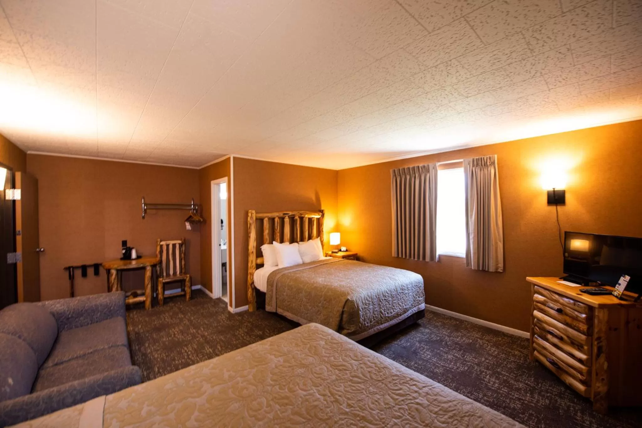 Bed in Super 8 by Wyndham Bridgeview of Mackinaw City