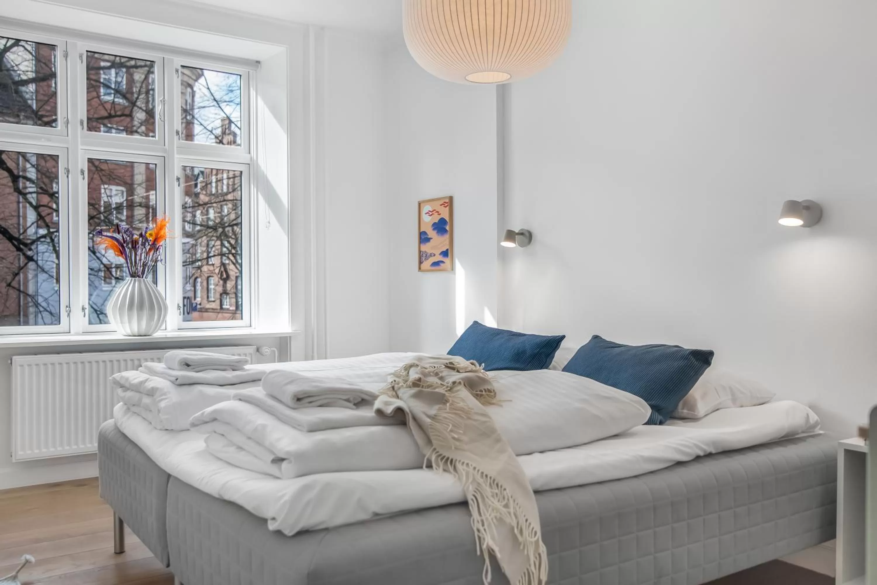 Bed in NABO Hotel Apartments