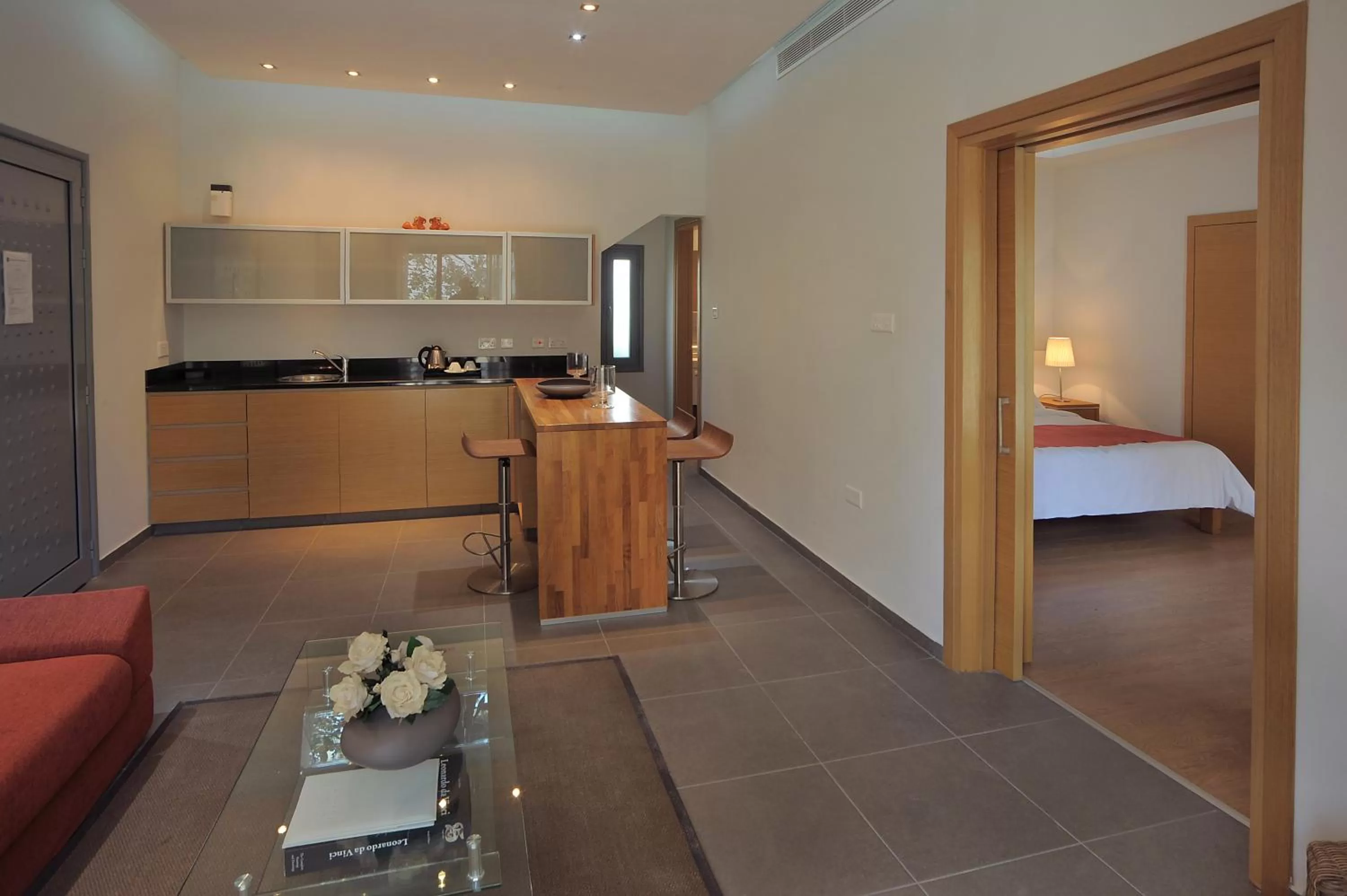 Kitchen or kitchenette, Bed in E-Hotel Larnaca Resort & Spa