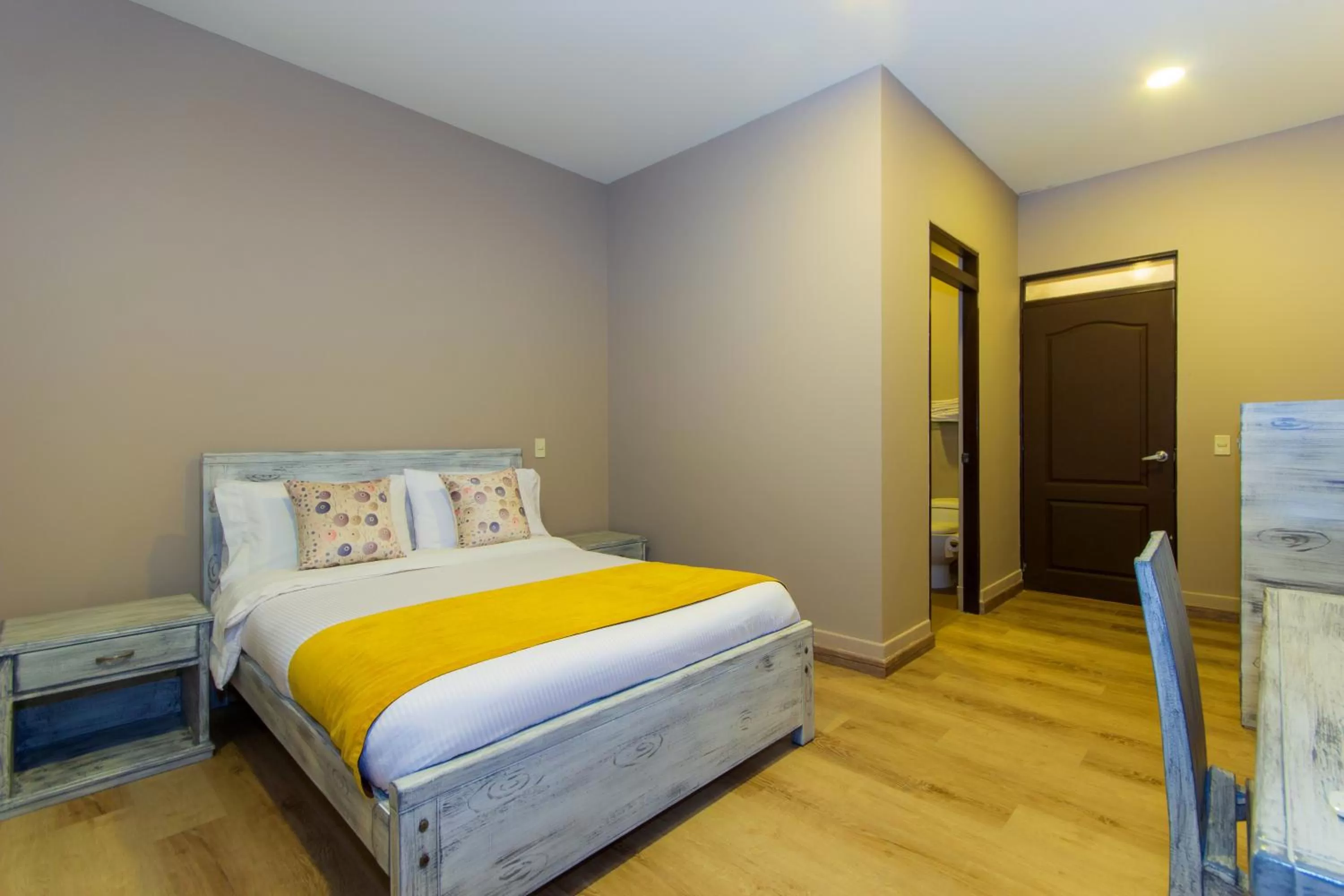 Bed in Hotel Xue Sabana