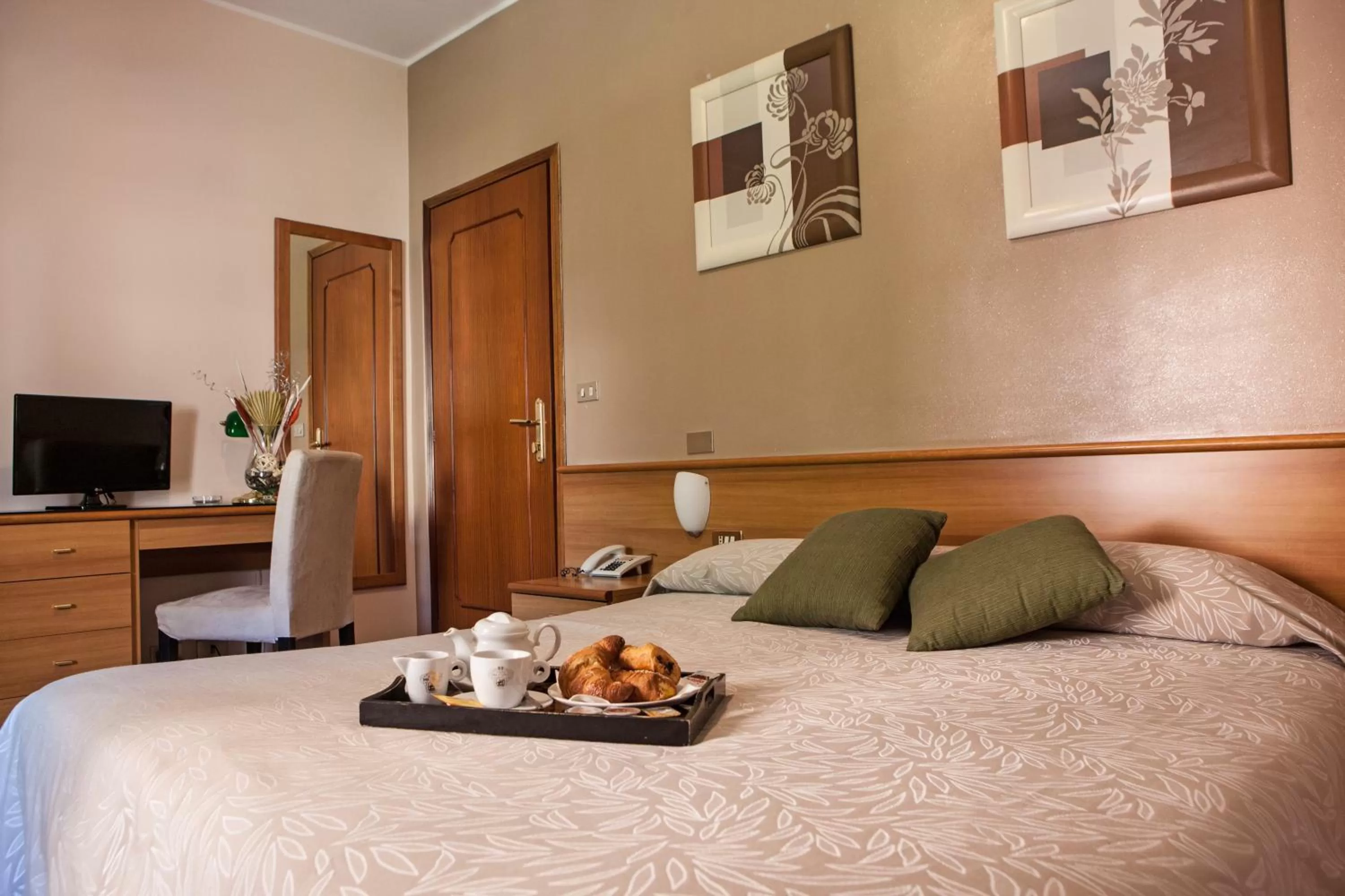 Bed in Hotel Adriano