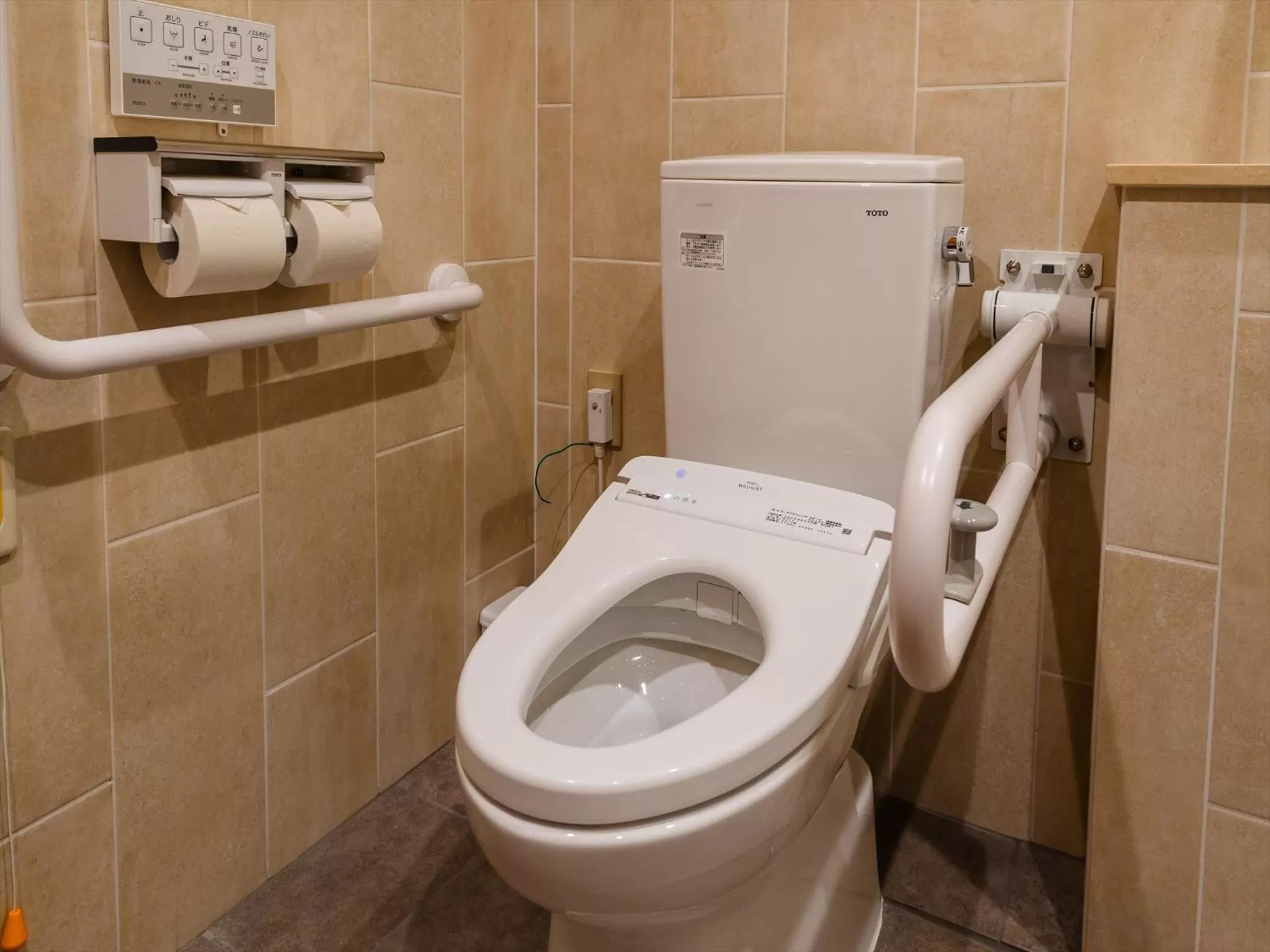 Toilet in oile by DSH Resorts