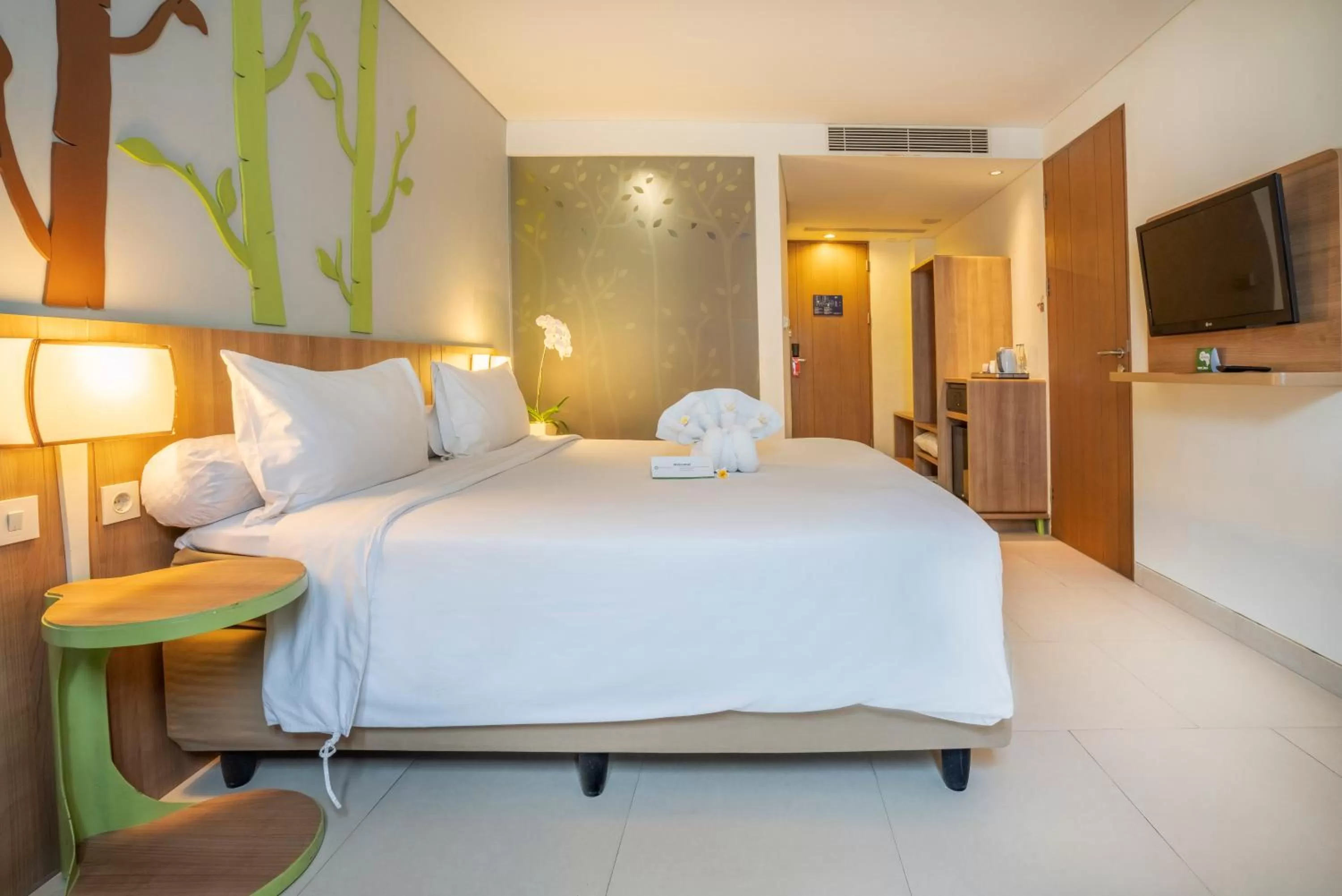 Bedroom, Bed in Grand Livio Kuta Hotel