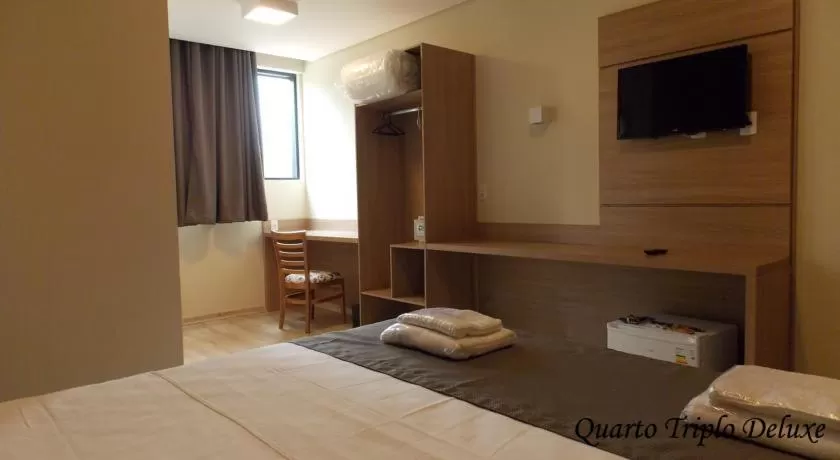 Bed in Minas Platinum Hotel & Convention