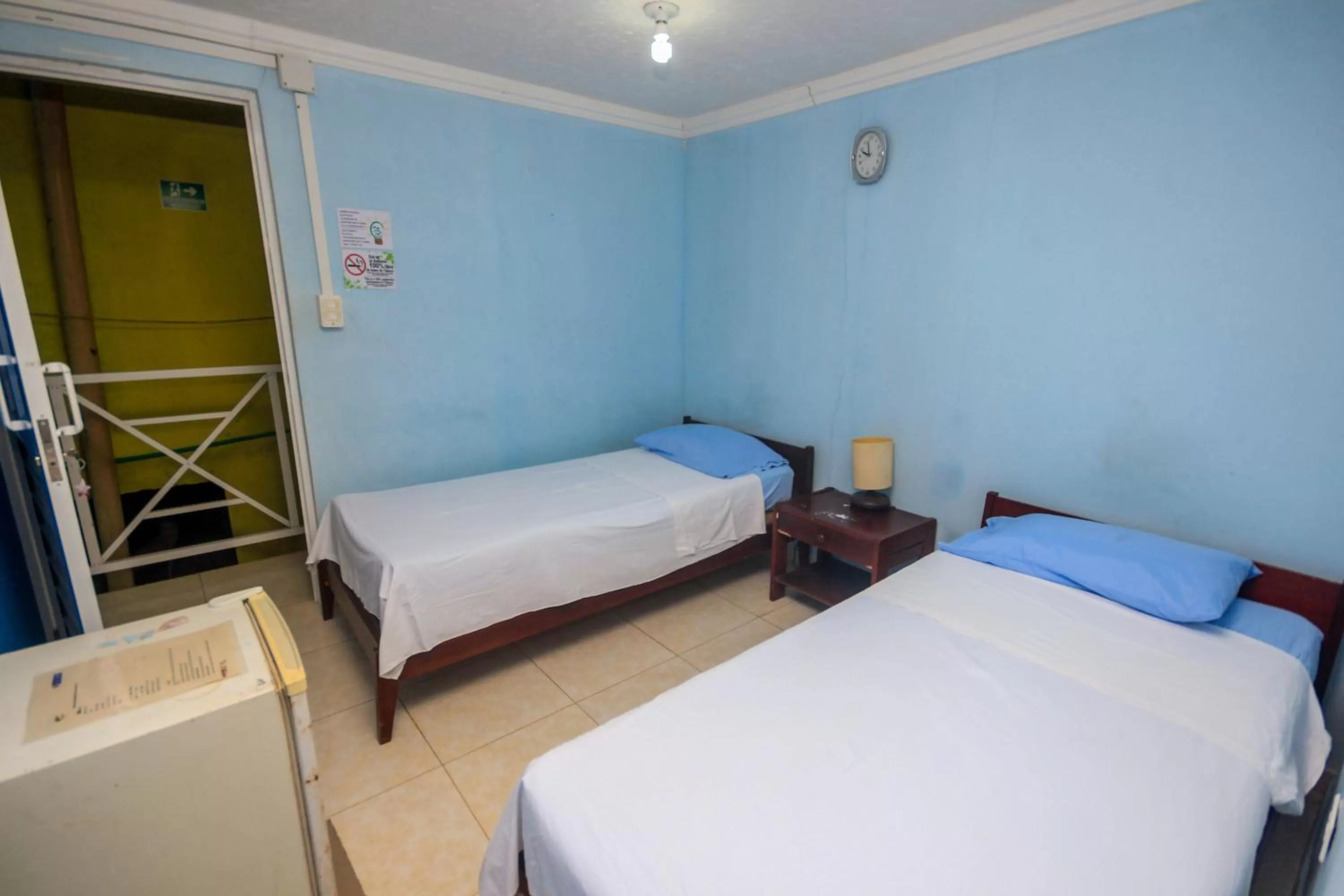 Bed in POSADA NATIVA DERMA´S INN