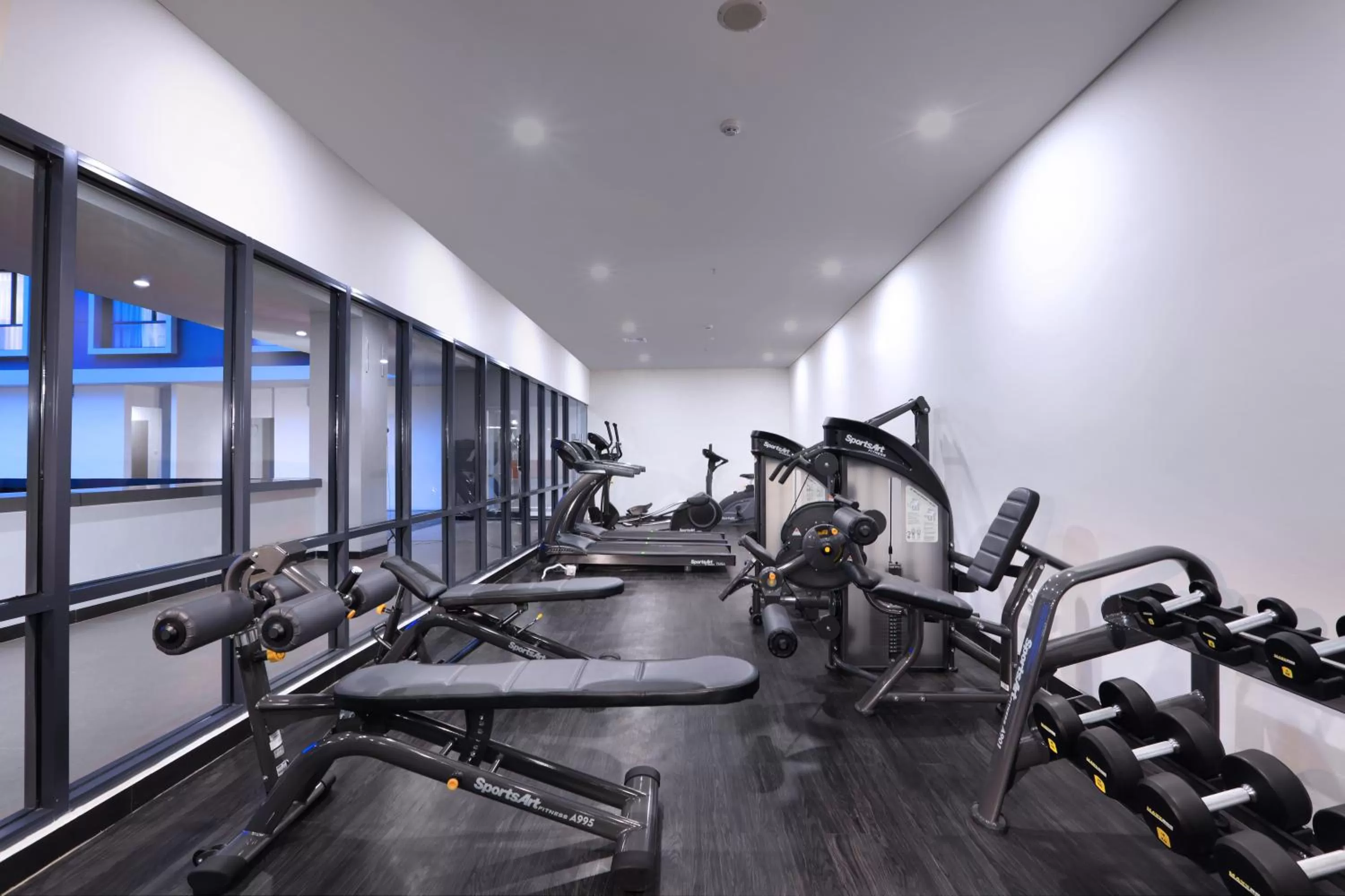 Fitness centre/facilities in Harper Palembang by ASTON
