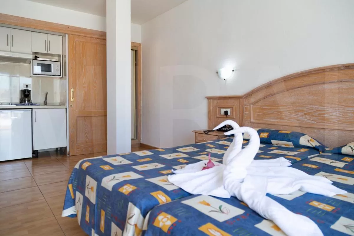 Kitchen or kitchenette, Bed in Hotel Casa del Sol