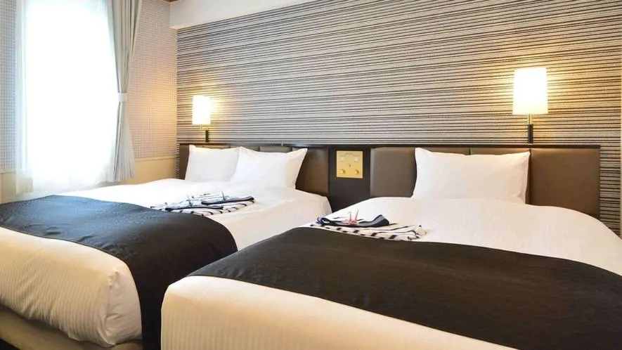 Bed in APA Hotel Beppu Ekimae