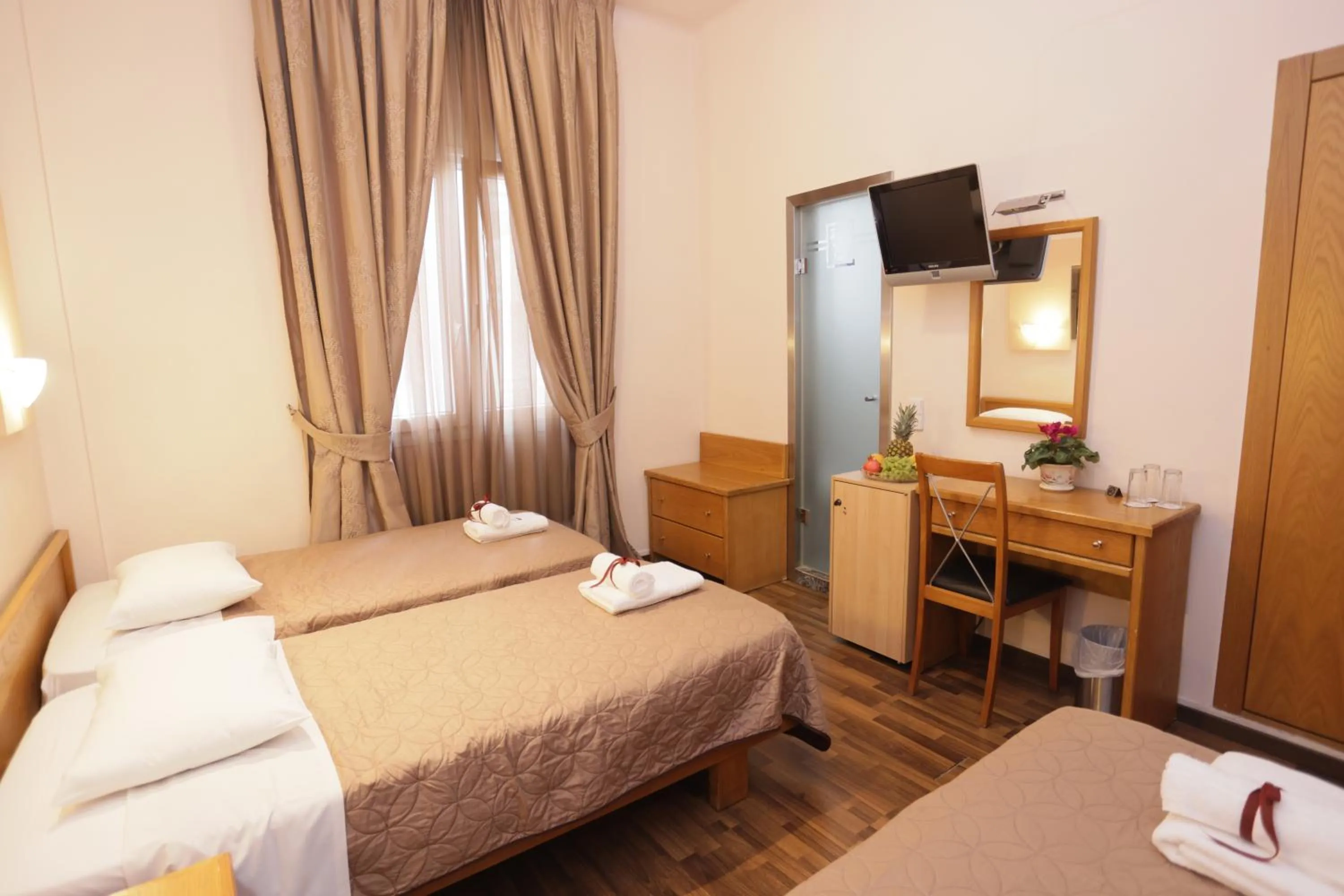 Photo of the whole room, Bed in Aegeon Hotel