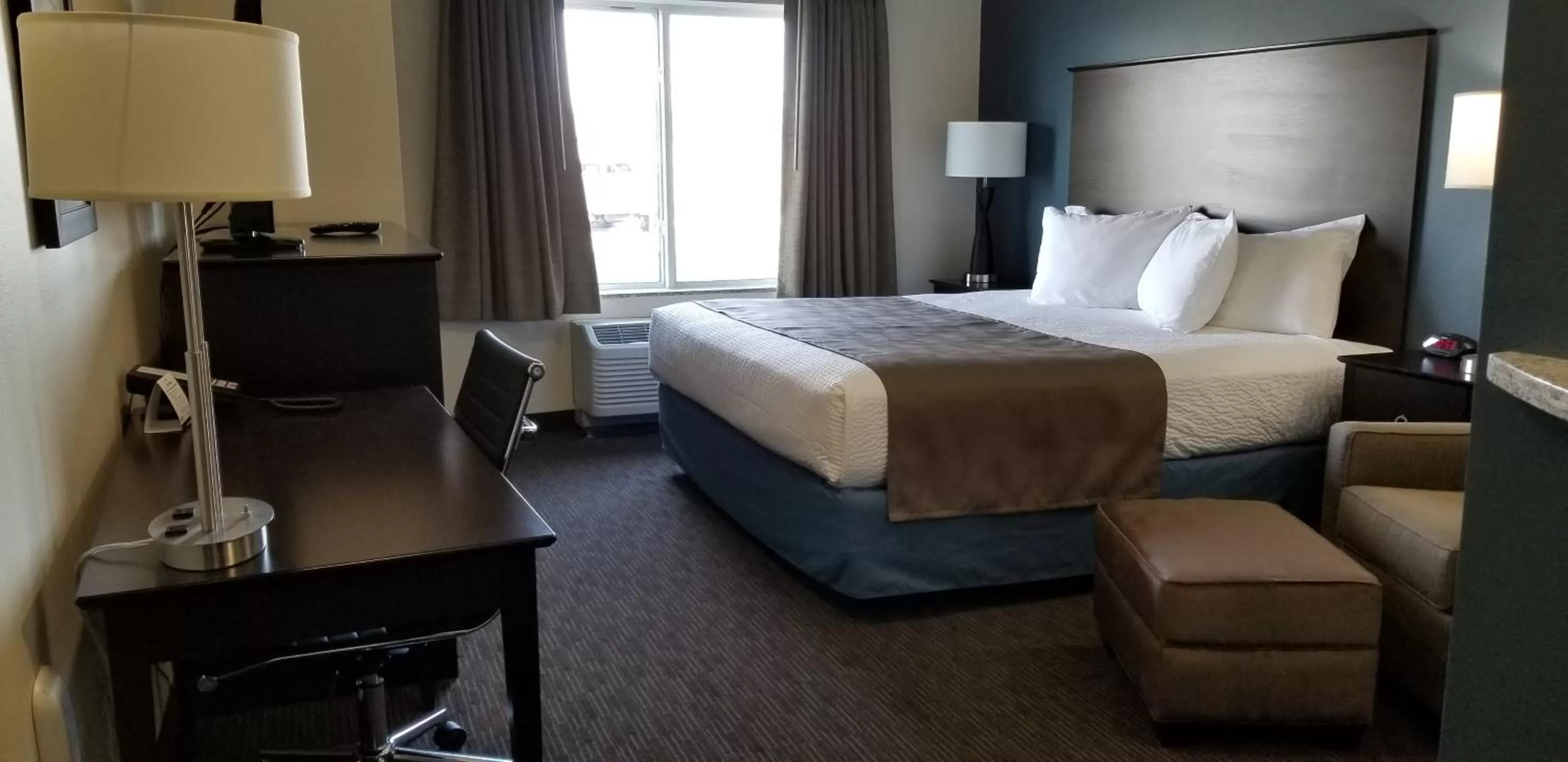Bed in AmericInn by Wyndham Sioux Falls North