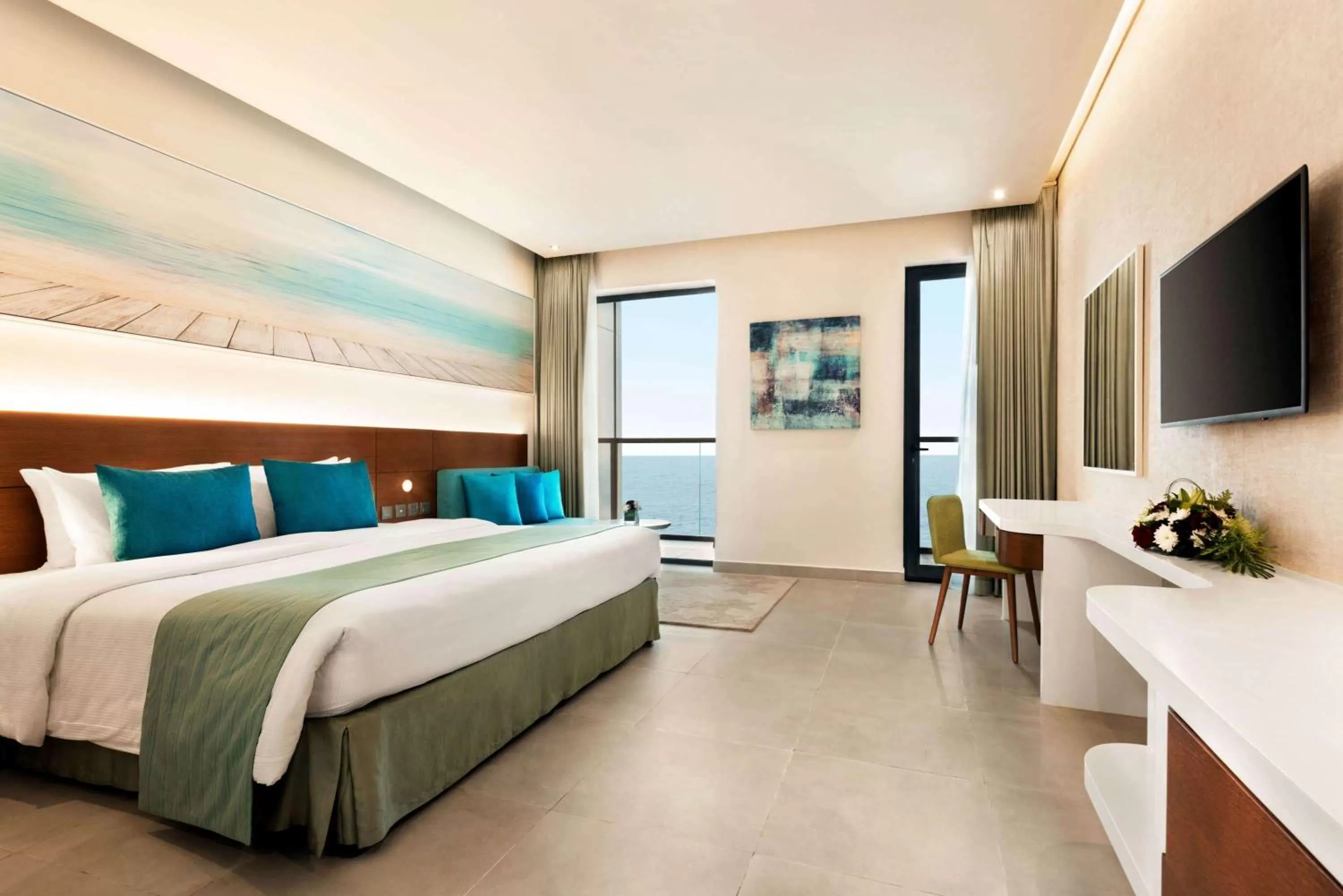 Photo of the whole room, Bed in Wyndham Garden Ajman Corniche