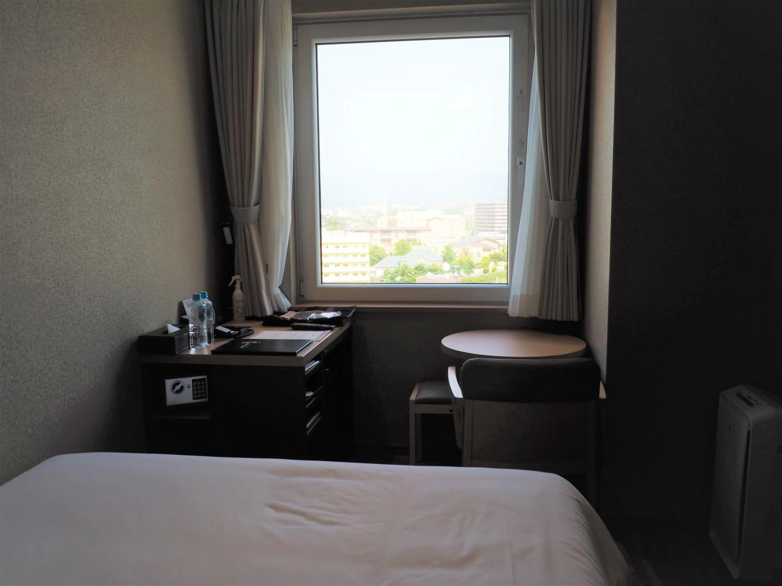 View (from property/room), Bed in Hakodate Yunokawa Onsen Umi to Akari Hewitt Resort