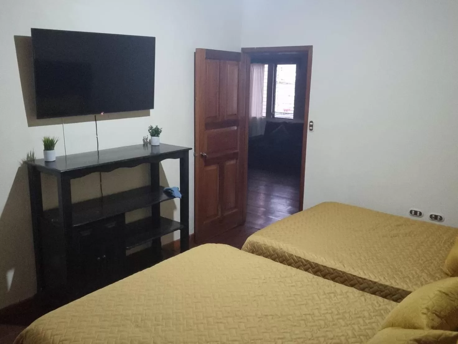 Bed in AZURA HOTEL BOUTIQUE