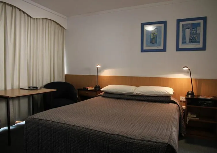 Bed in Barclay Motor Inn