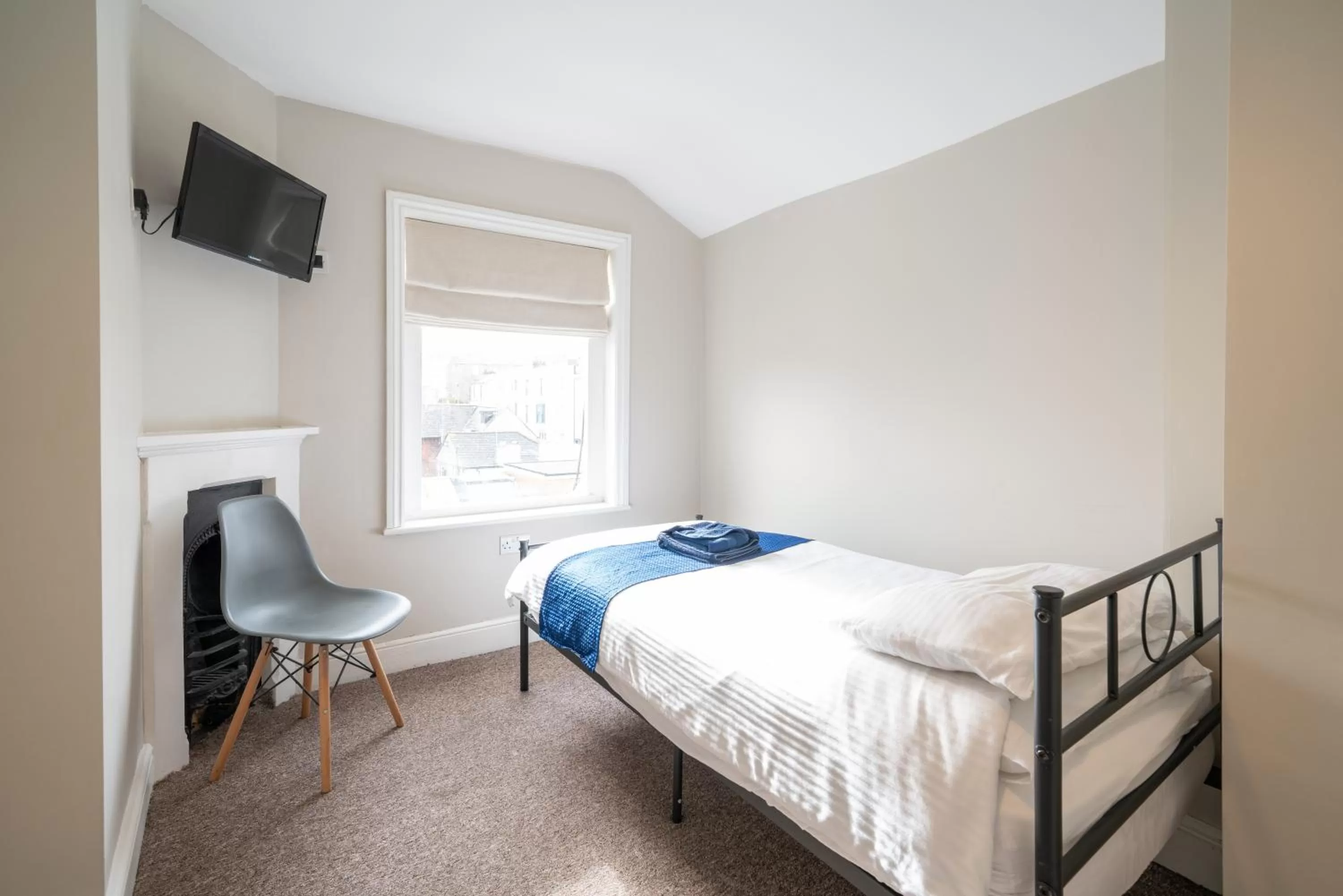 Bed in The Veteran Hotel & Bar