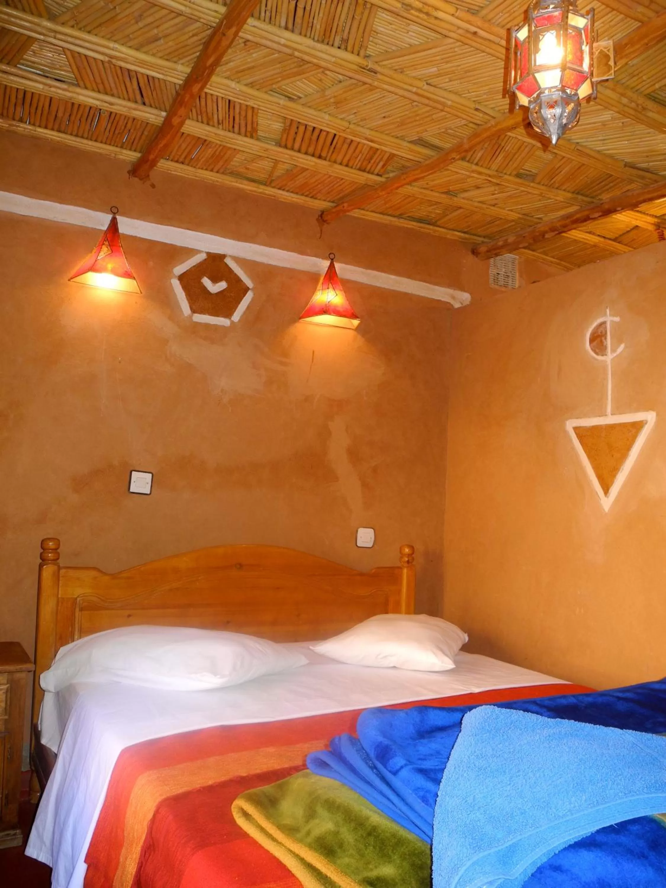 Bed in Maison d'Hôte Valentine