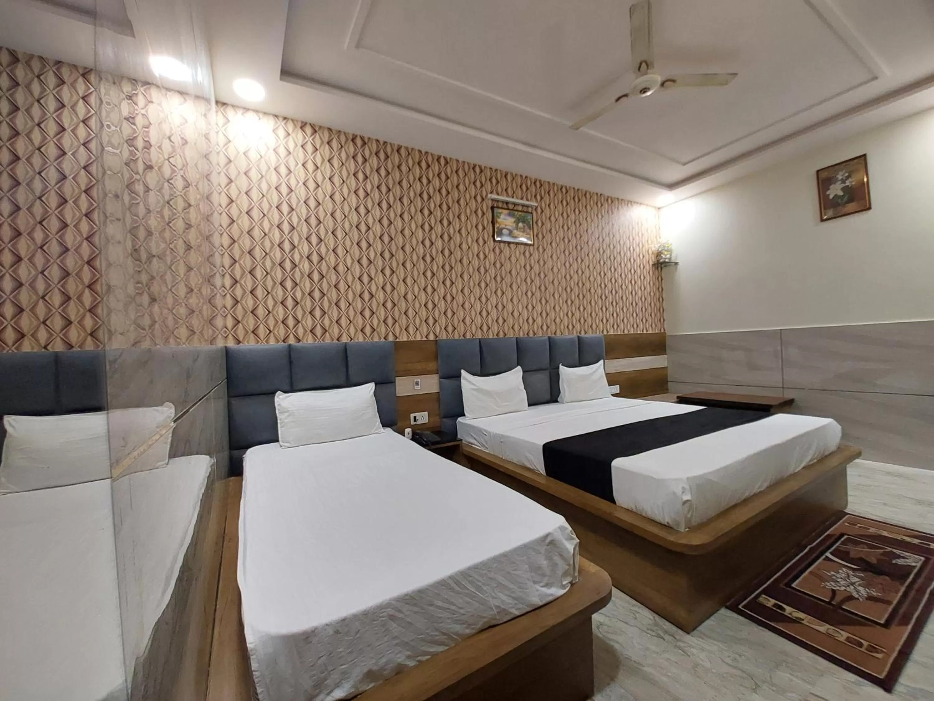 Bed in Taj Nice Point Manage by Taj Sunrise Group