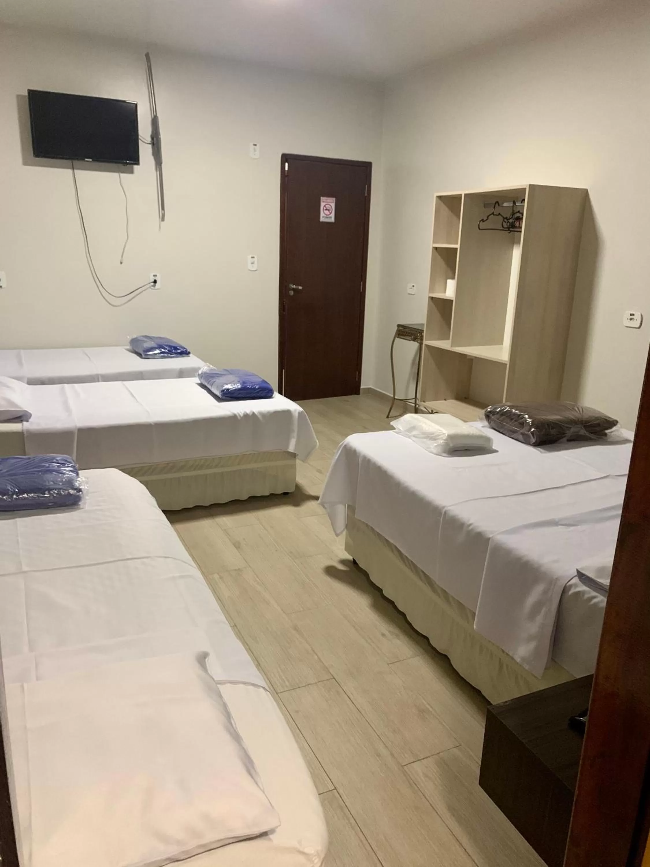 Bed in Hotel Paradizzo