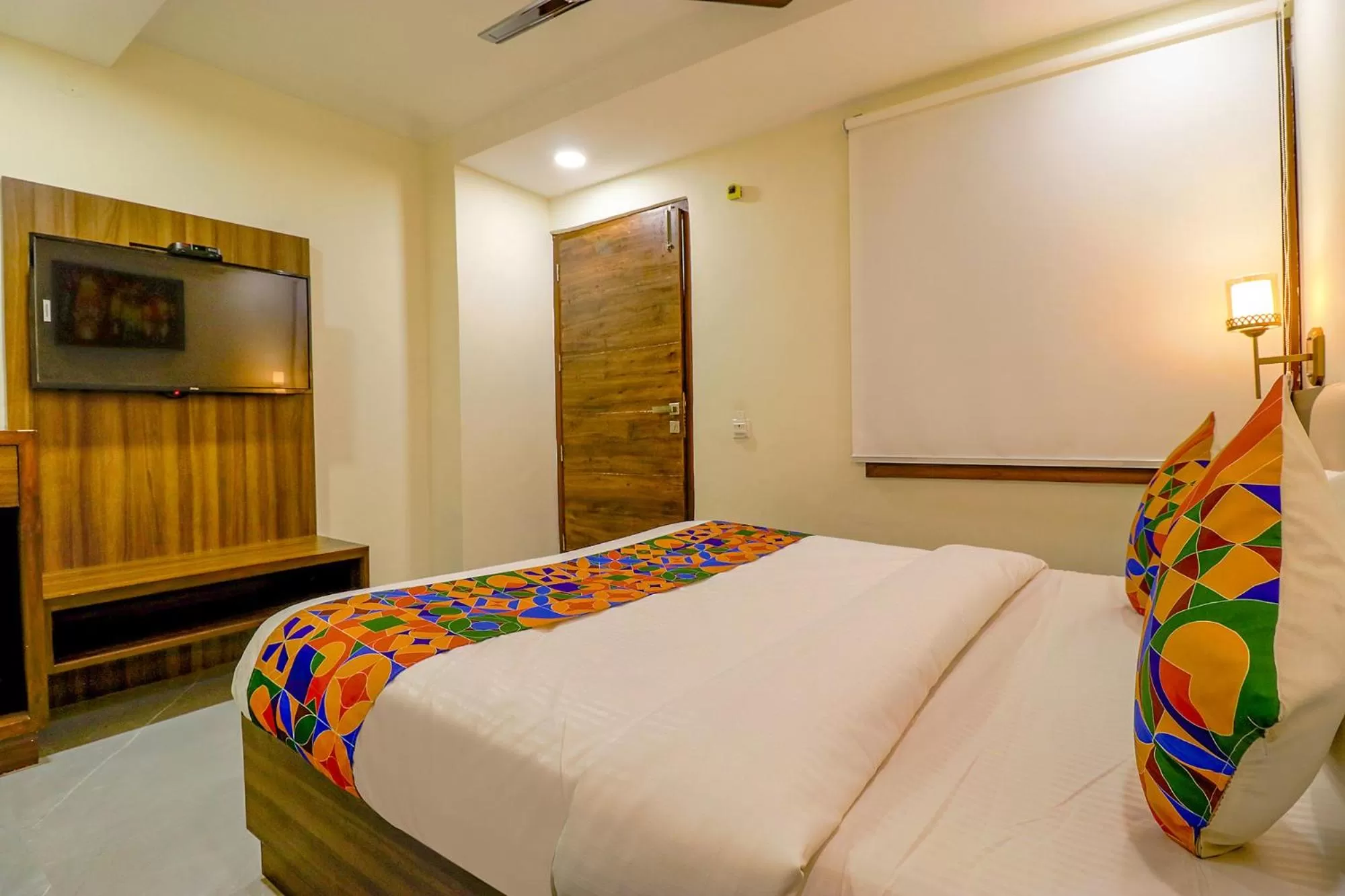 Bed in FabHotel Prime K9 Regency