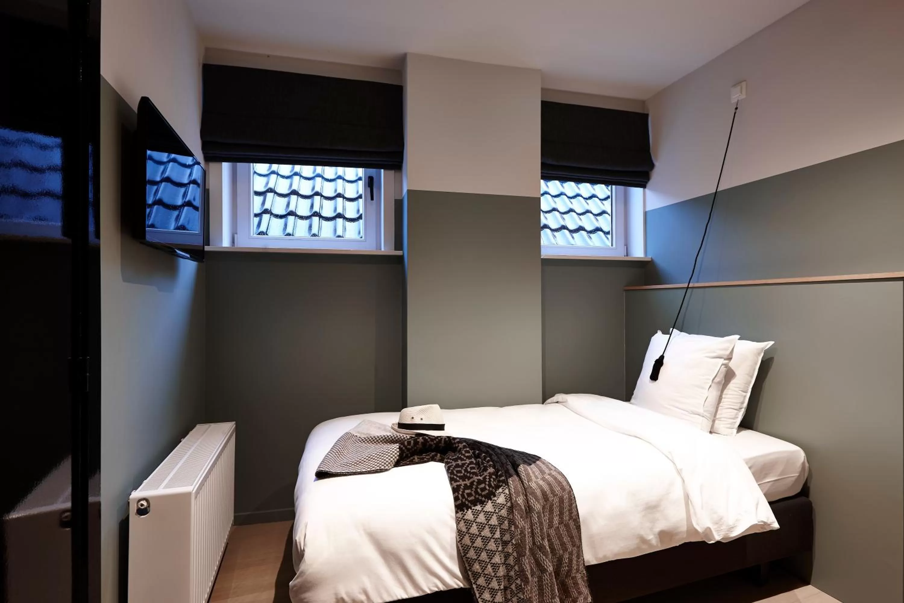 Bed in Hotel Monsieur Ernest