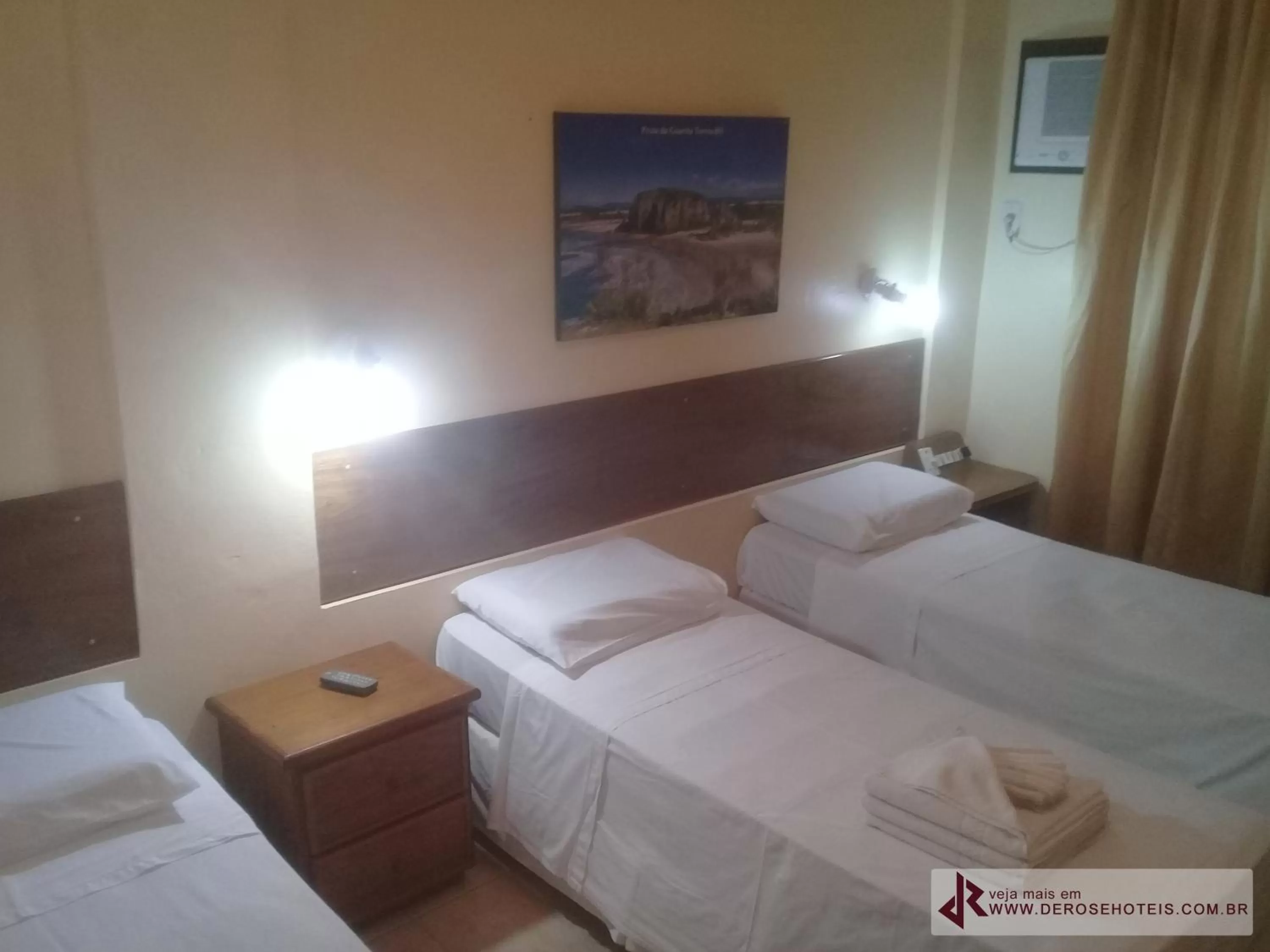 Bed in De Rose Palace Hotel