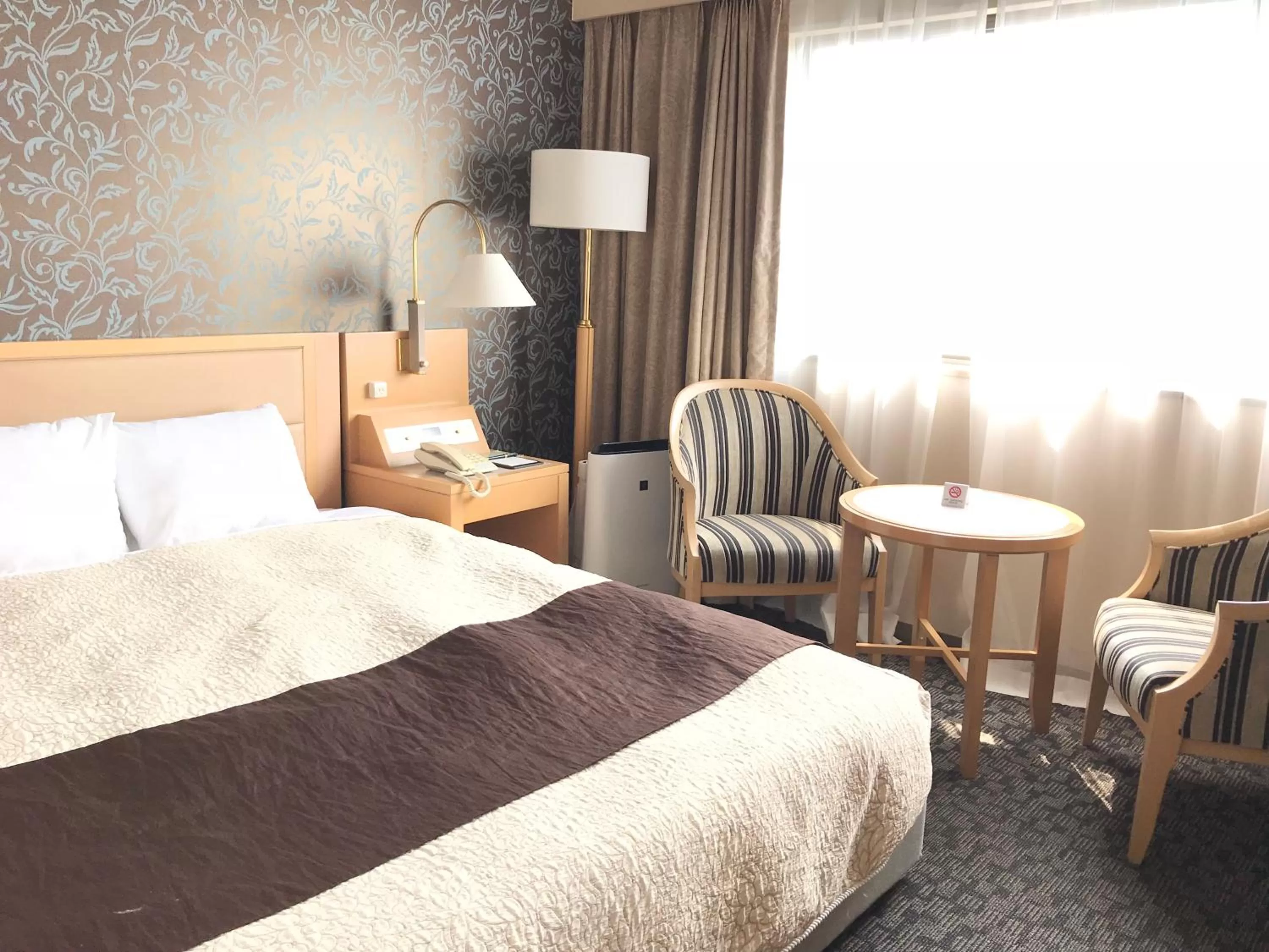 Bed in Numazu River Side Hotel