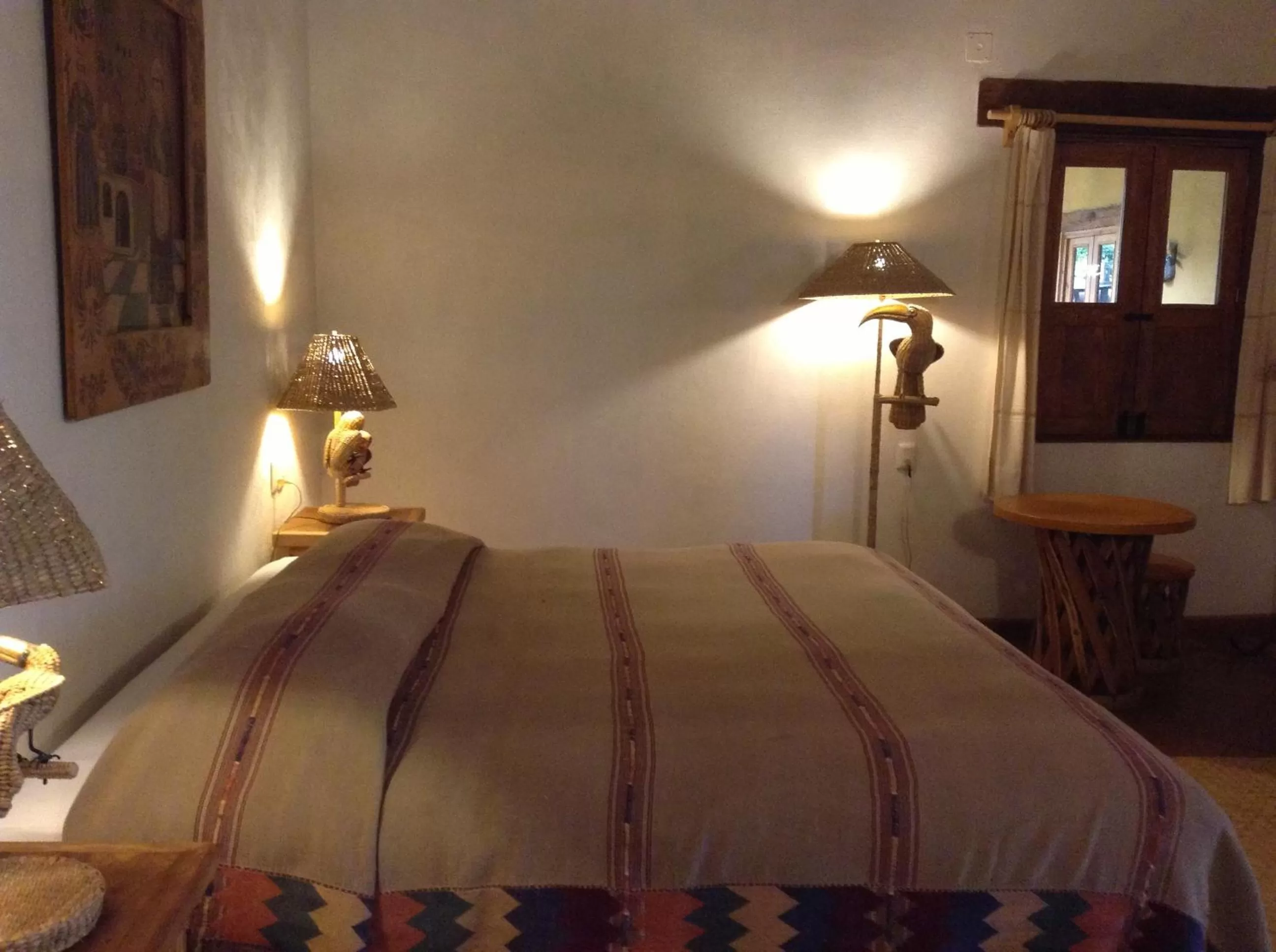 Photo of the whole room, Bed in Posada Yolihuani