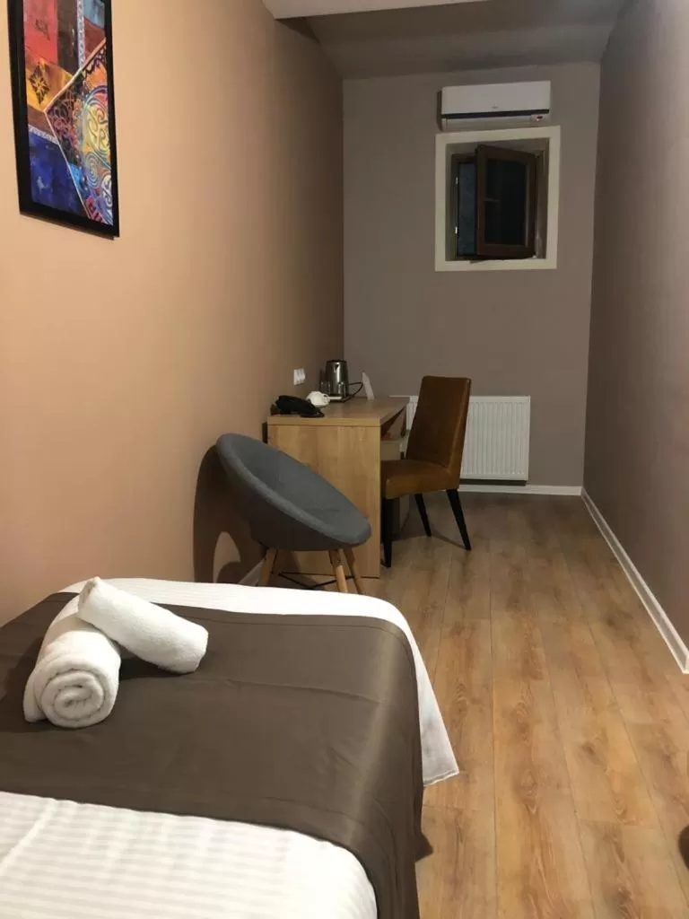 Seating area, Bed in Boho Tiflis Hotel