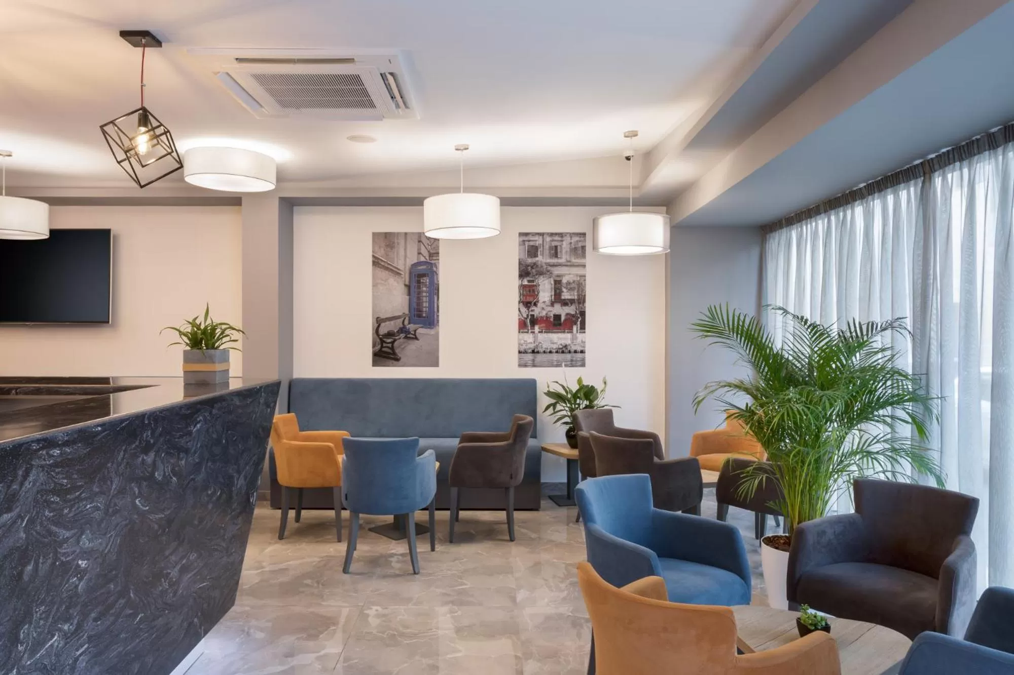 Lobby or reception in Azur Hotel by ST Hotels