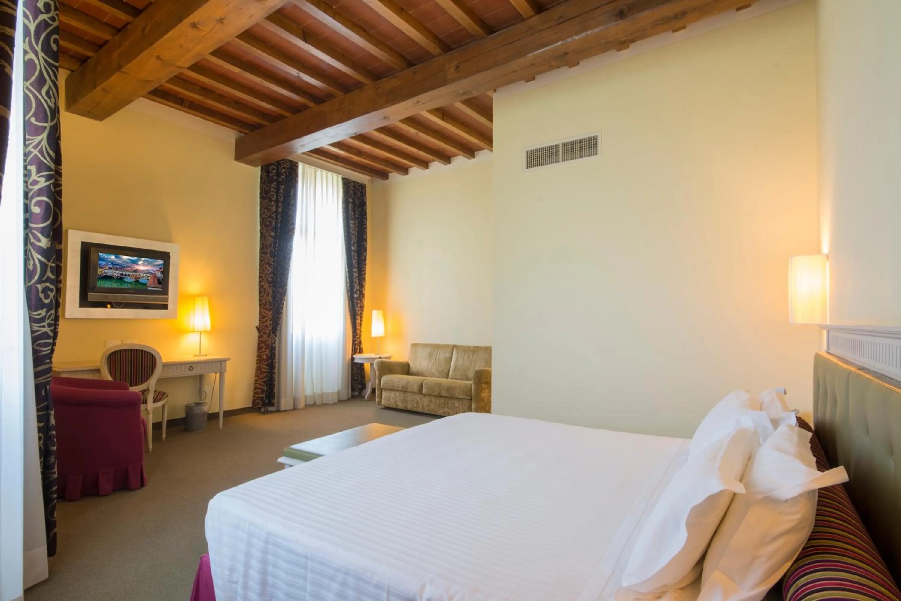 Photo of the whole room, Bed in LHP Certaldo Resort