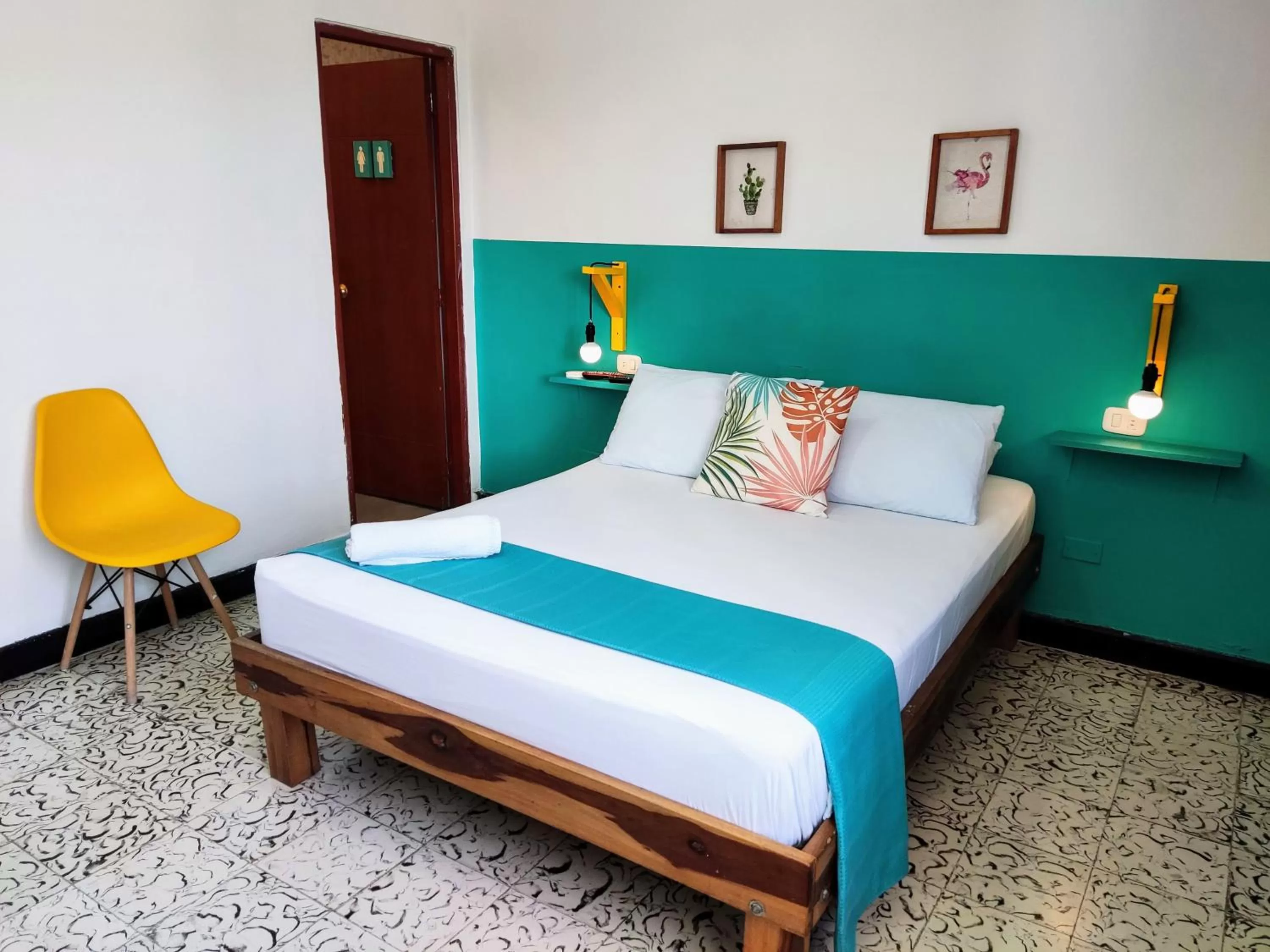 Bed in Bona Vida Hotel