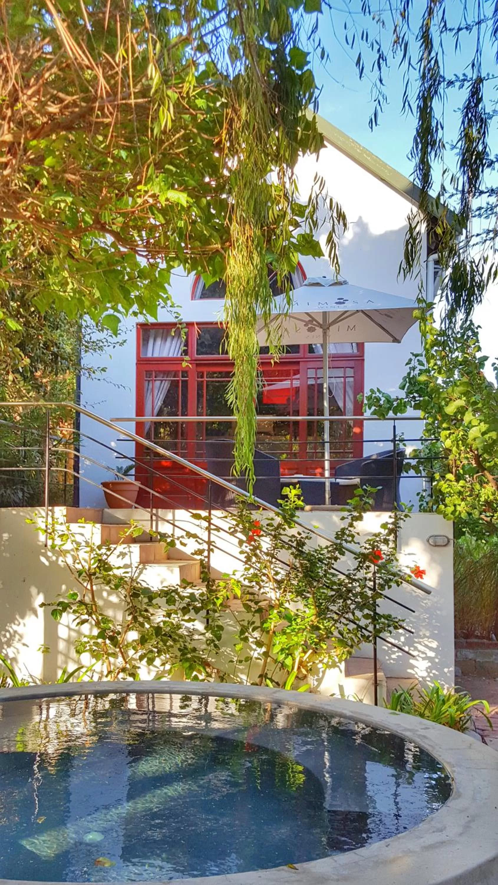 Swimming pool in Mimosa Lodge
