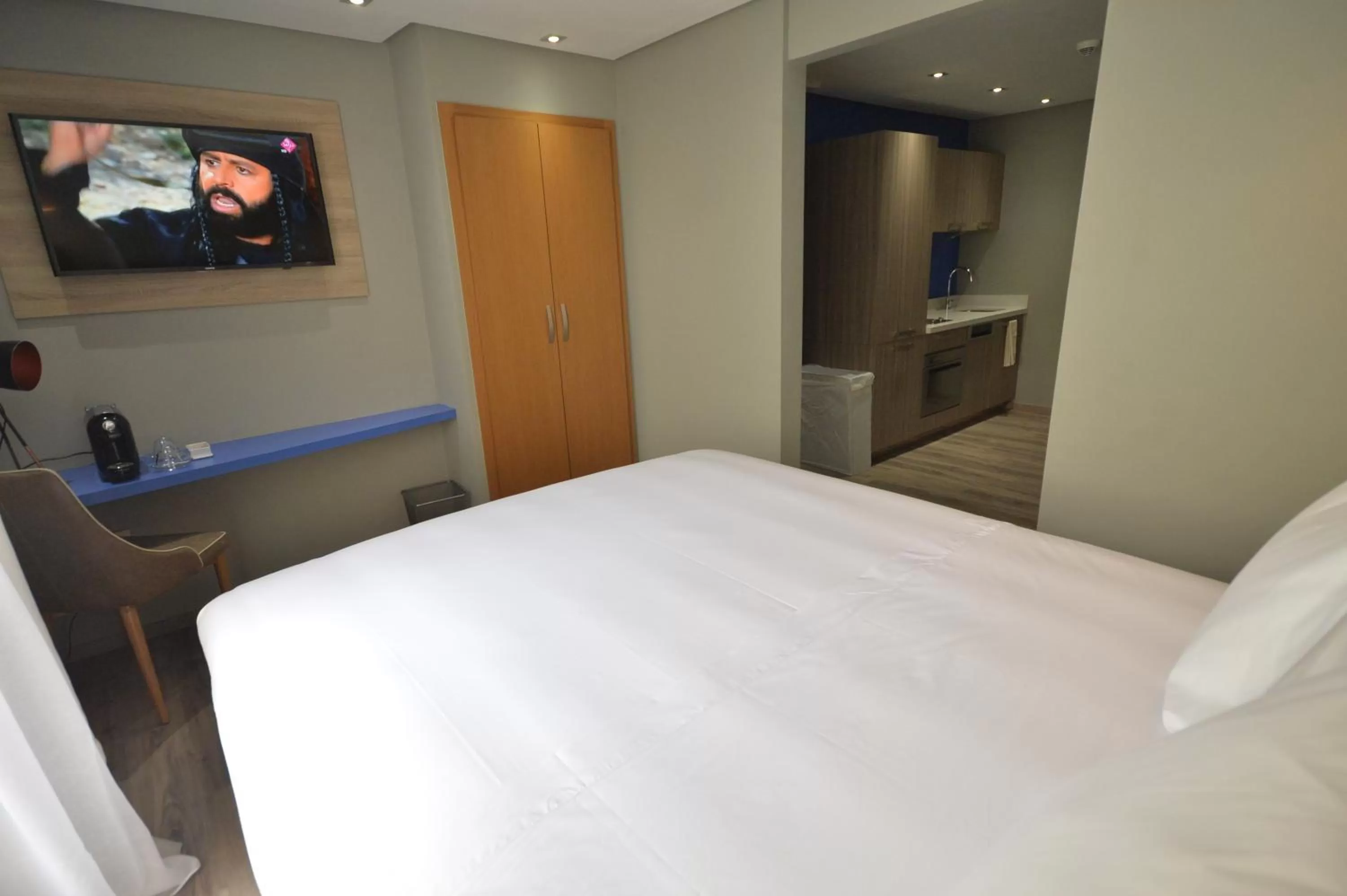 Bed in Le 22 Appart'Hotel