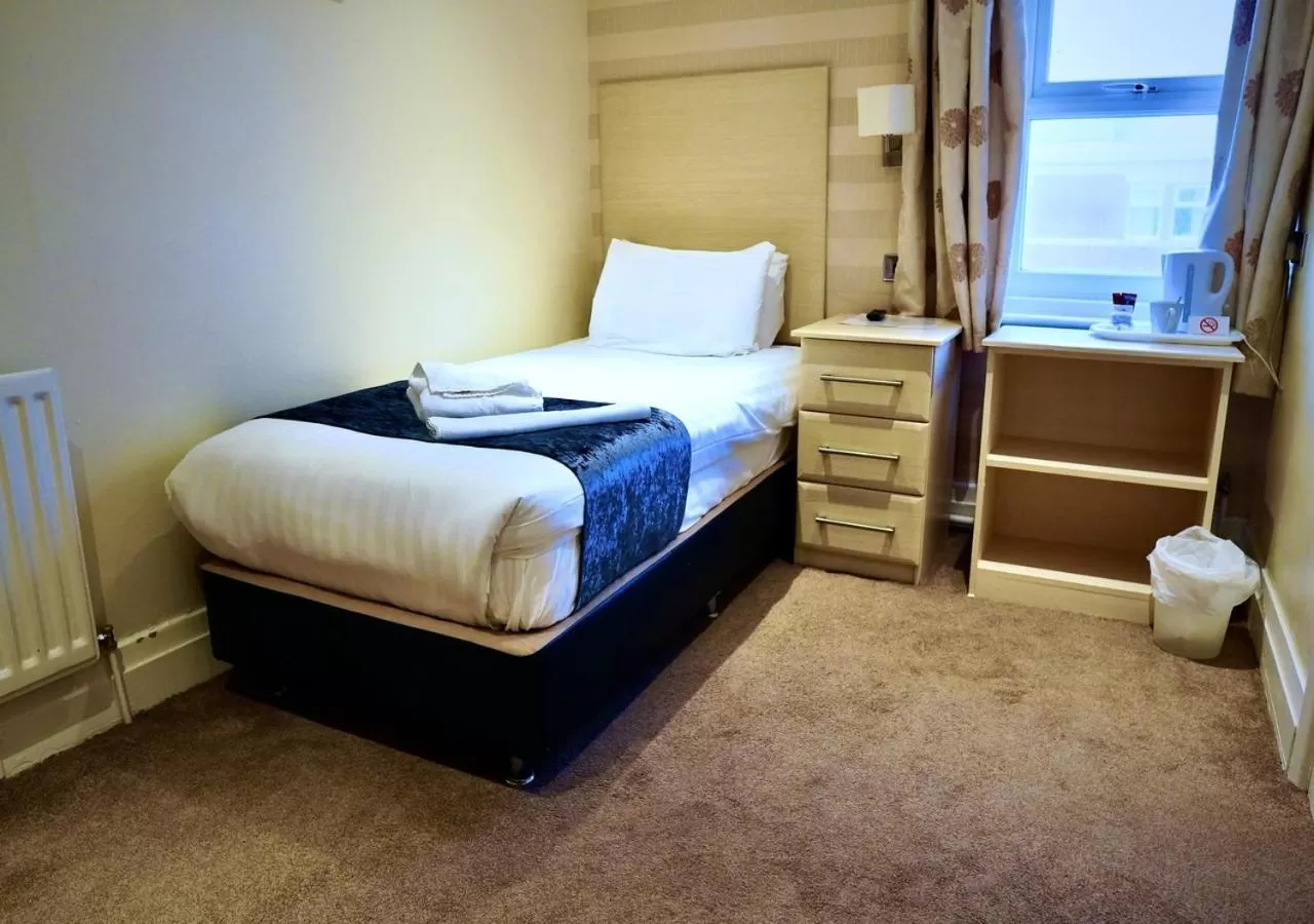 Bed in The Royal Boston Hotel by Compass Hospitality