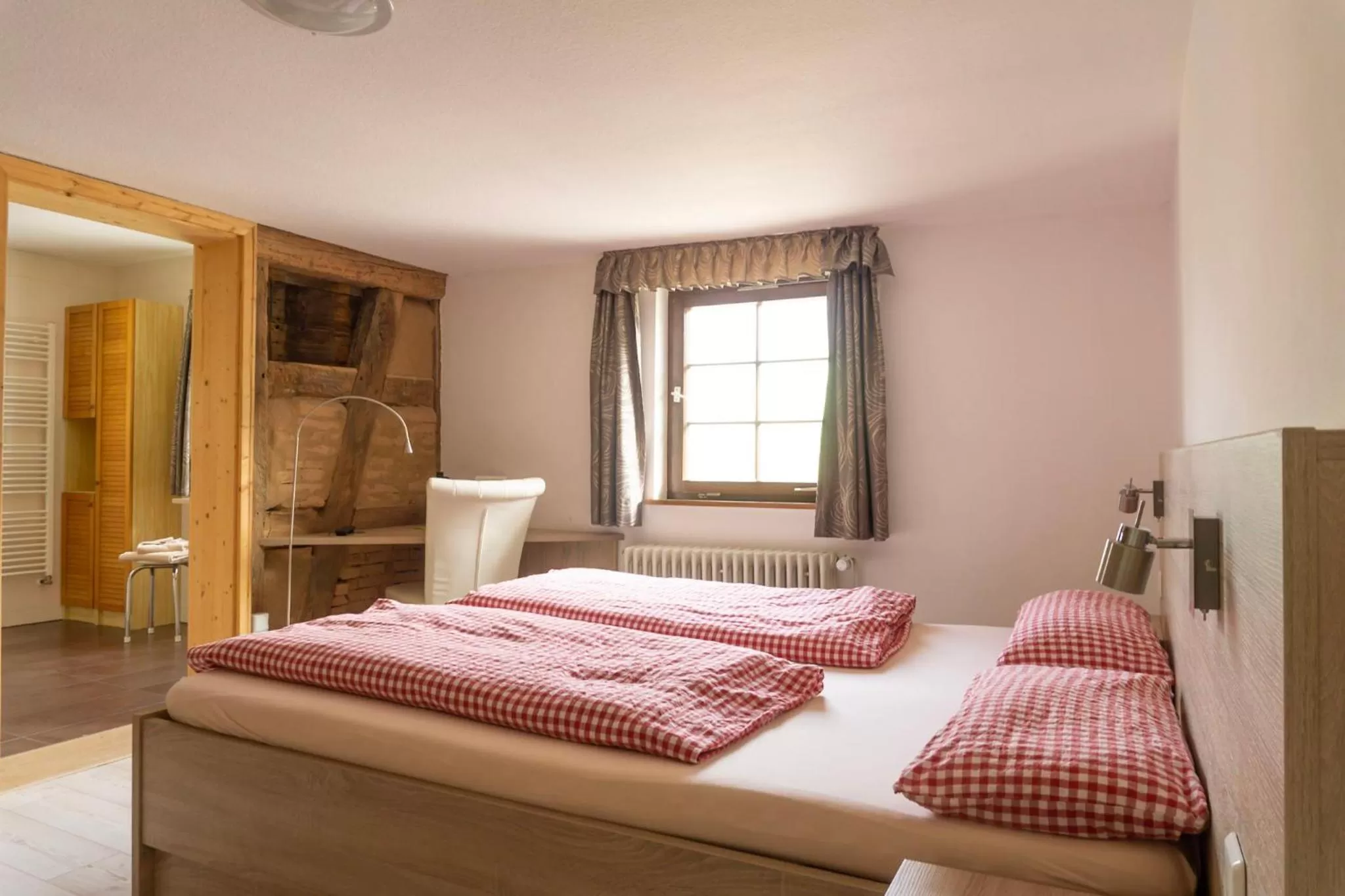 Bedroom in Naturhotel Holzwurm