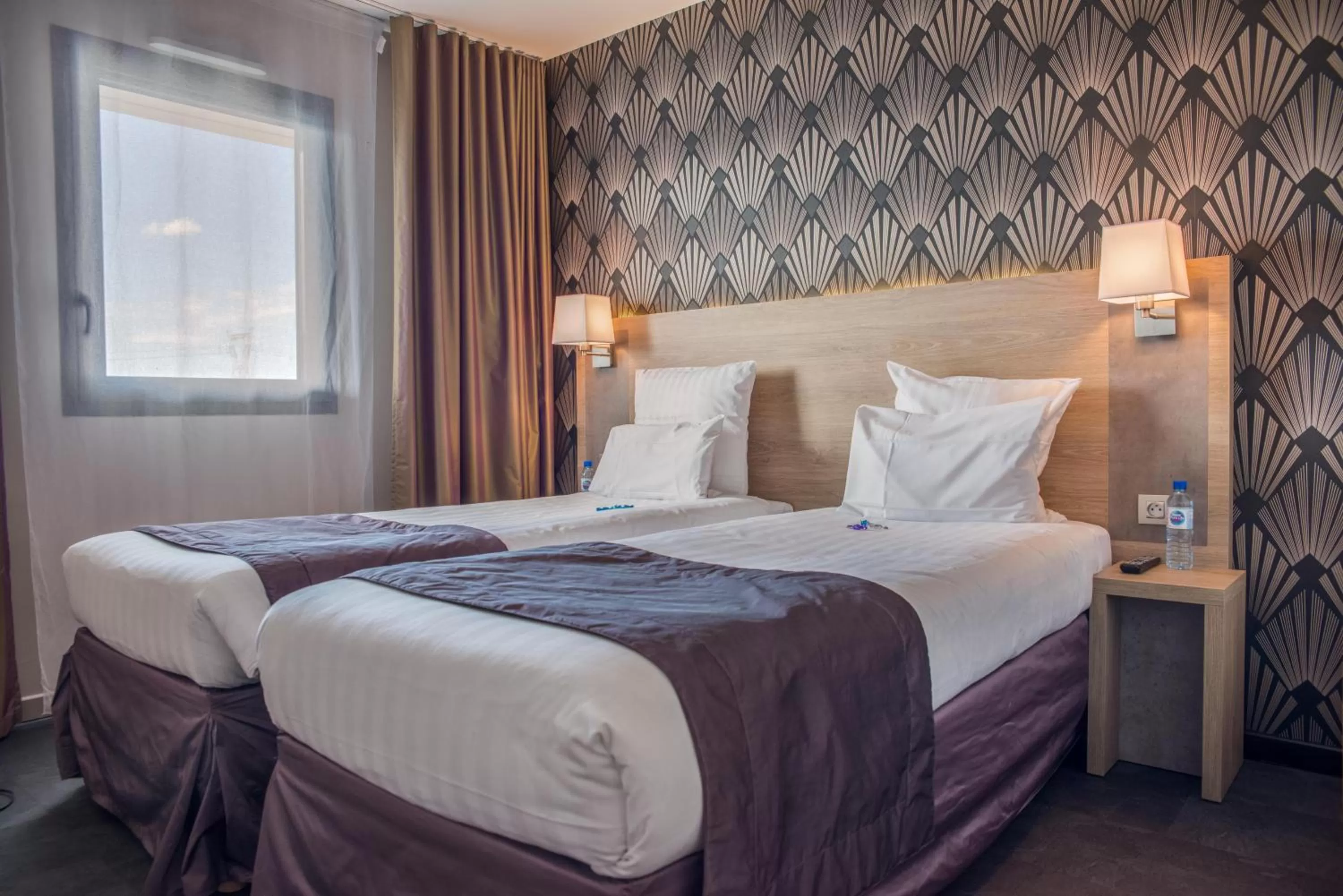 Bed in Best Western Les Aureliades Saint Nazaire