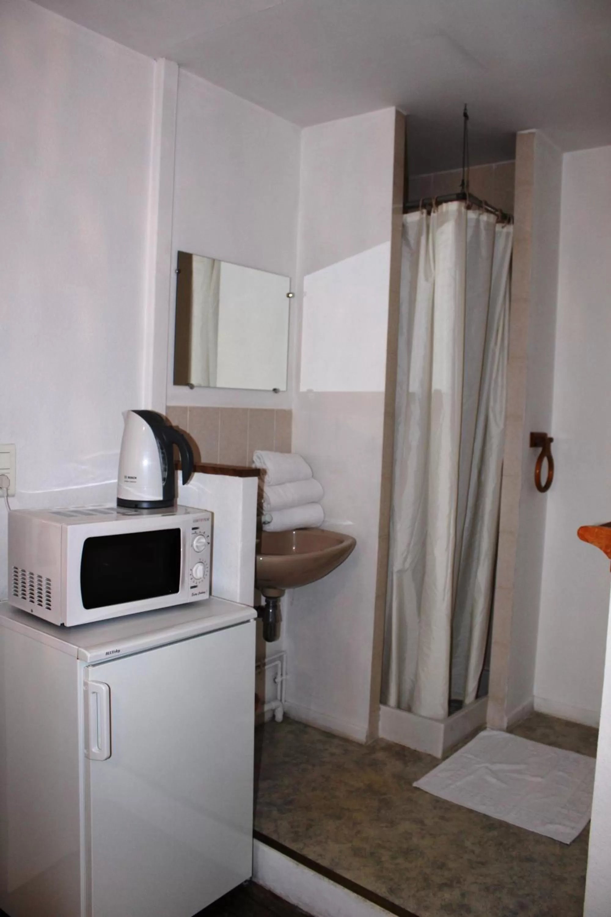 Kitchen/Kitchenette in Résidence et Chambres d'Hôtes de La Porte d'Arras