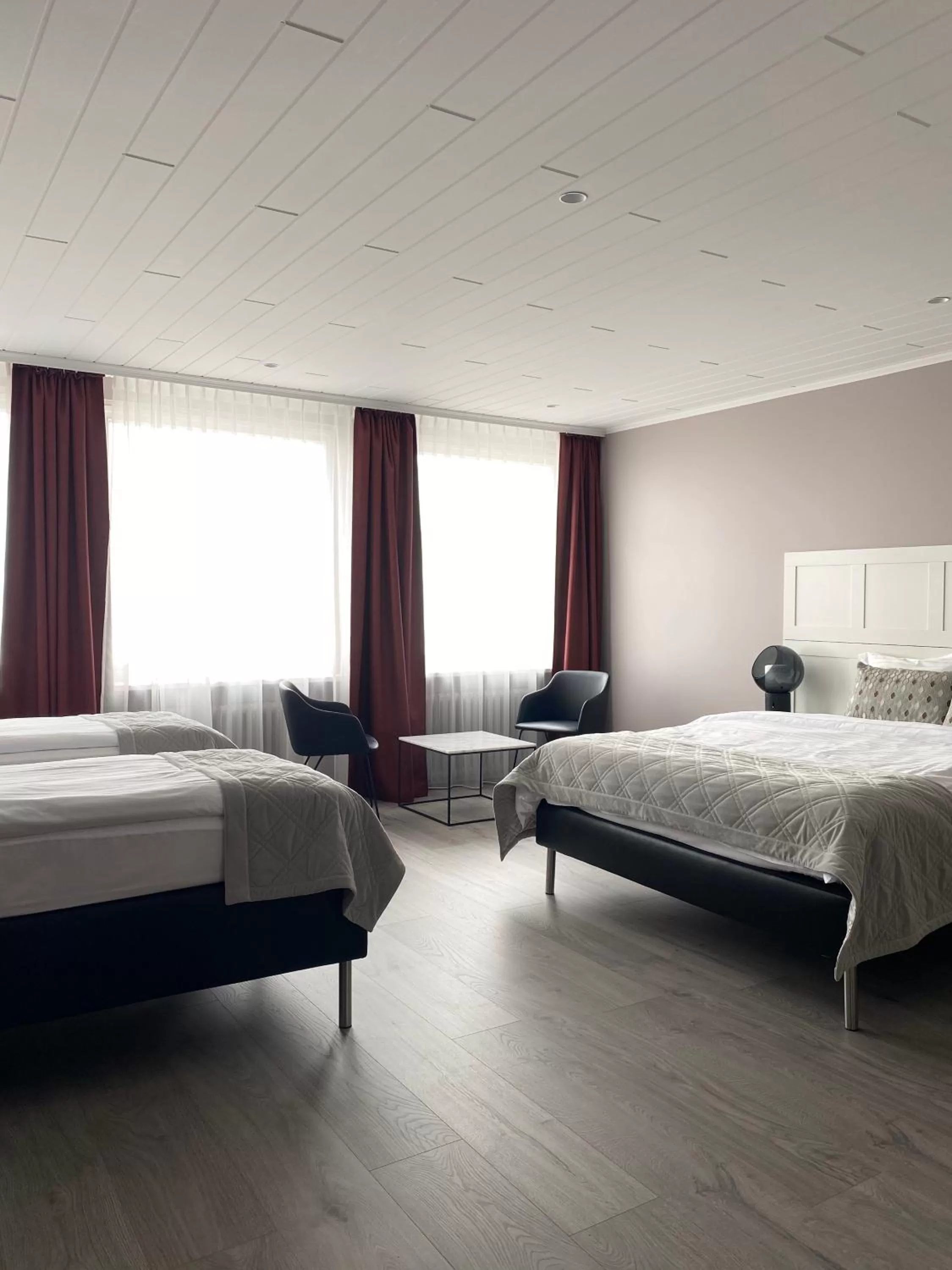 Quadruple Room in Room With a View Hotel